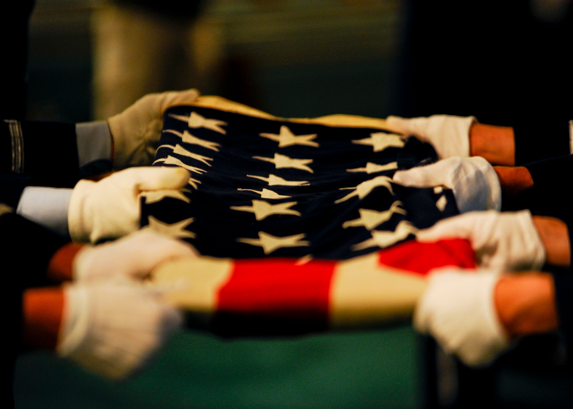 22nd Air Refueling Wing and 184th Intelligence Wing Honor Guard Airmen fold a 48-star American Flag, Aug. 10, 2015, in Wichita, Kan. The flag and one other were presented to the family of Staff Sgt. Dale Francis and Pfc. Paul Edward Kingsley when they died in 1943 and 1944, respectively, during World War II. The American flag contained only 48 stars until 1959, when Alaska and Hawaii were admitted as the 49th and 50th states in the union, respectively. (U.S. Air Force photo by Senior Airman Victor J. Caputo)