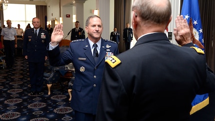 Gen. David L. Goldfein is given the Oath of Office by Chairman of the Joint Chiefs of Staff Gen. Martin Edward "Marty" Dempsey during his promotion ceremony Aug. 6, 2015, in Washington, D.C.  Goldfein will become the Air Force's 38th Vice Chief of Staff, and most recently served as the director of the Joint Staff.  (U.S. Air Force photo/Scott M. Ash)