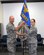 910th Maintenance Group Commander Col. David Post and 910th Aircraft Maintenance Squadron Commander Maj. Catherine Correa pose for a photo while Correa receives the squadron guidon. Correa assumed command of the Aircraft Maintenance Squadron during a ceremony here, July 31, 2015. (U.S. Air Force photo/Tech. Sgt. Rick Lisum)