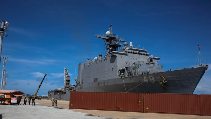U.S. Marines and sailors with the 31st Marine Expeditionary Unit and the USS Ashland offload relief supplies from the ship for typhoon recovery efforts in Saipan, Aug. 8, 2015. The MEU and the ships of the Bonhomme Richard Amphibious Ready Group will assist the Federal Emergency Management Agency in delivering the supplies to the victims of Typhoon Soudelor in Saipan. The island, part of the Commonwealth of the Northern Mariana Islands, was struck by the typhoon Aug. 2-3. 