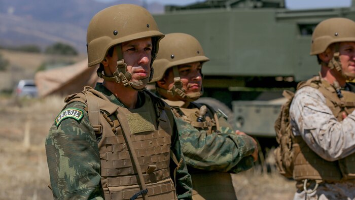 Brazilian Major Rafael Pires Ferreira, an artillery officer with Corpo de Fuzileiros Navais, observes the tactical capabilities of 5th Battalion, 11th Marine Regiment’s M142 High-Mobility Artillery Rocket System aboard Marine Corps Base Camp Pendleton, Calif., Aug. 9, 2015. The two Brazilian officers visited to share and discuss information on military operations, unit structure and different weapons systems.