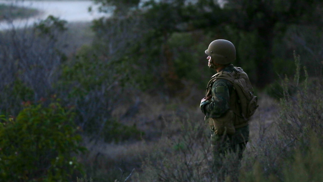 Brazilian Captain Rodrigo Cerqueira Gomes, an artillery officer with Corpo de Fuzileiros Navais, observes the tactical capabilities of 5th Battalion, 11th Marine Regiment’s M142 High-Mobility Artillery Rocket System aboard Marine Corps Base Camp Pendleton, Calif., Aug. 9, 2015. The two Brazilian officers visited to share and discuss information on military operations, unit structure and different weapons systems.