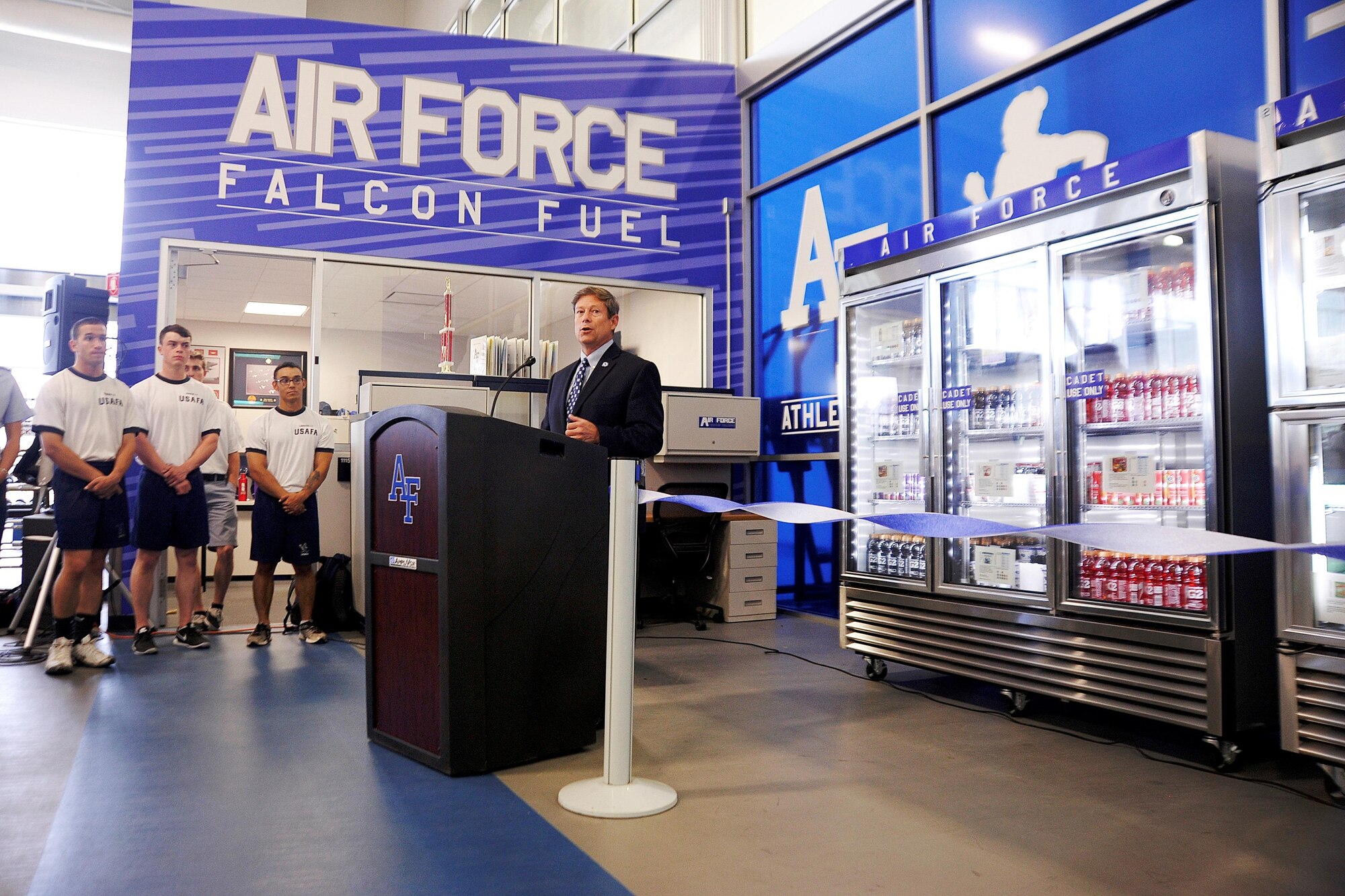 Jim Knowlton, the U.S Air Force Academy's athletic director, speaks at the Falcon Fuel ribbon cutting ceremony Aug. 5, 2015. The Falcon Fuel program provides cadets with extra nutrition by placing 12 healthy food stations near cadet workout areas. (U.S. Air Force photo/Mike Kaplan)