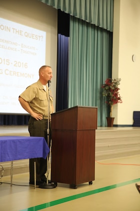 Colonel Peter D. Buck addresses teachers aboard Laurel Bay family housing during an opening ceremony for the new school year at Middleton S. Elliott Elementary School, Aug. 10. Buck expressed his gratitude towards the Laurel Bay school system for their support to the community. Buck is the commanding officer for Marine Corps Air Station Beaufort. (U.S. Marine Corps photo by Lance Cpl. Jonah Lovy/Released) 