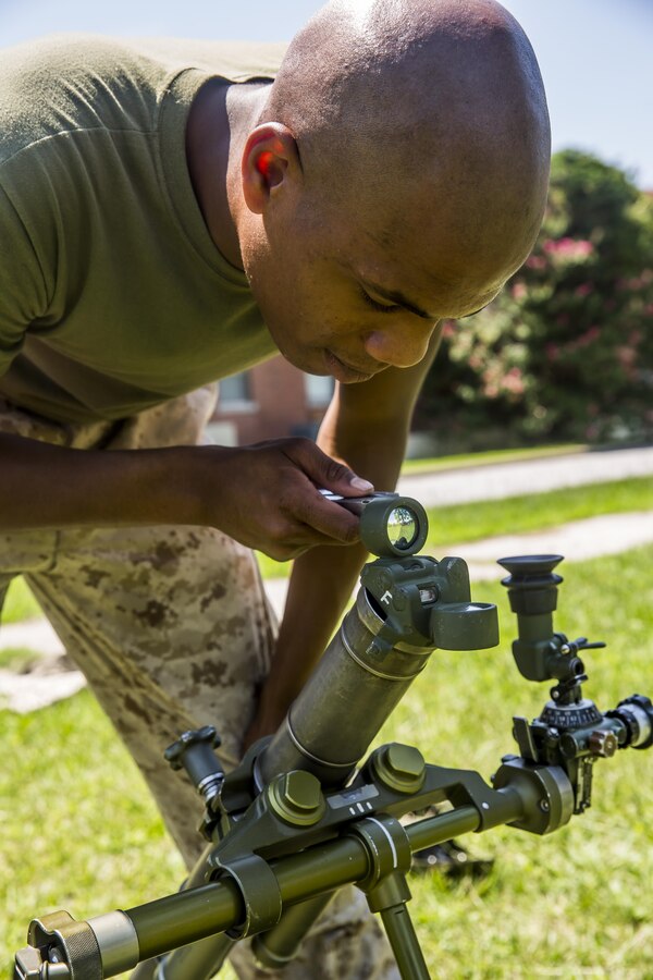 Lance Cpl. William Emory, a mortarman with 1st Battalion, 8th Marine Regiment adjusts the sight on the M224 60 mm Mortar Lightweight Company Mortar System during a 10-day long 60 mm Mortar Lightweight Company Mortar System (LCMS) course under the direction of the Division Combat Skills Center (DCSC) aboard Camp Lejeune, N.C., Aug. 10, 2015. The course began with classroom instruction over the weapons system in which they learned how to boresight, misfire procedures, and deflection changes for elevation before the unit moves into live-fire. (U.S. Marine Corps photo by Cpl. Krista James/Released)