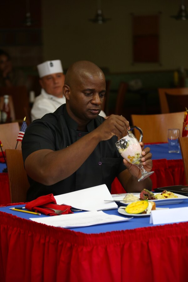Judges critique Marines selected menus during the Chef of the Quarter competition at Marine Corps Air Station Cherry Point, N.C., Aug. 6, 2015. Two Marines with Headquarters and Headquarters Squadron and one Marine with Marine Wing Support Squadron 274 put their skills to the test as they were judged on presentation, taste, bearing and their food service knowledge during the event. The competition allows Marines to use their creativity to prepare meals rather than their routine menus at the galley.
