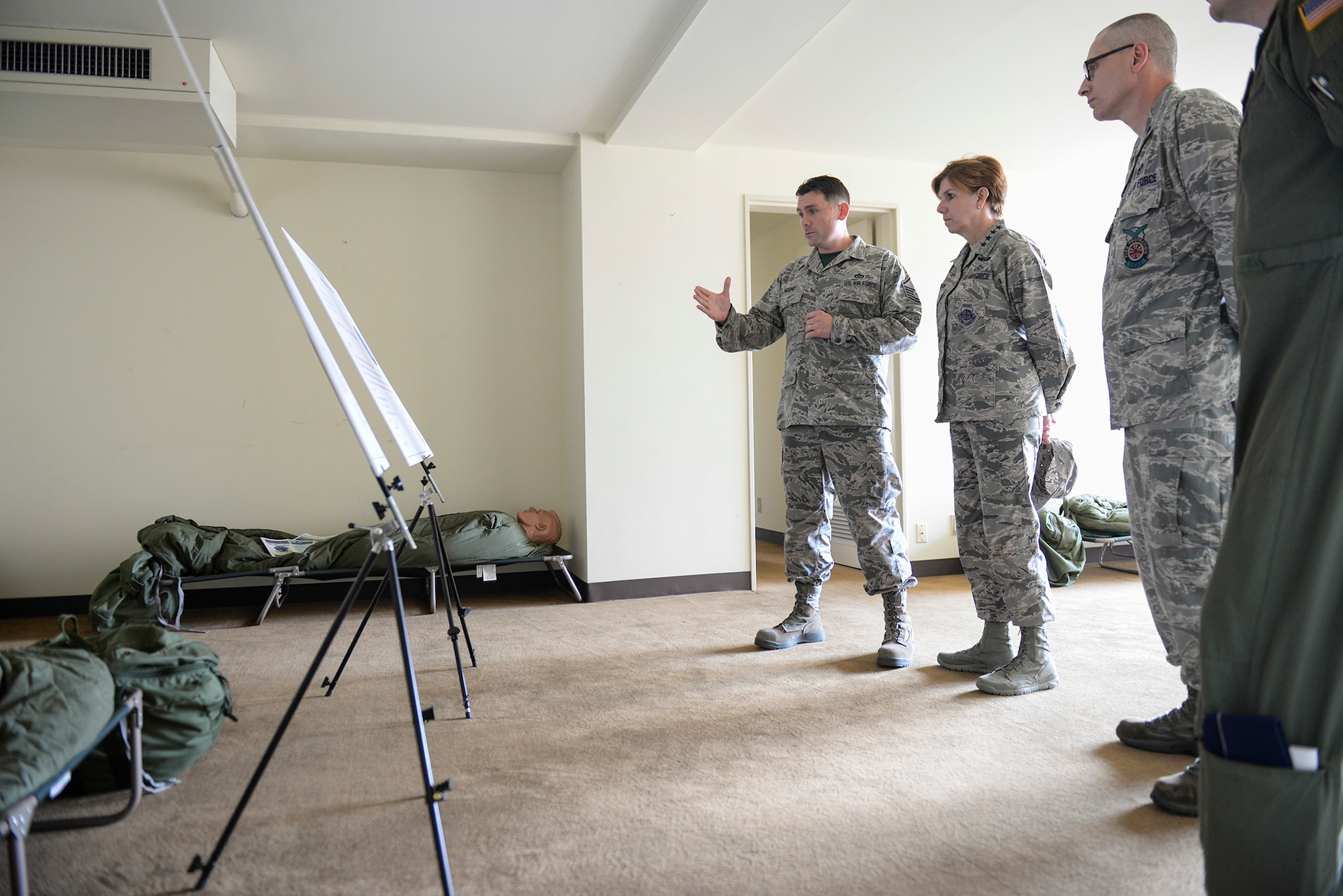 U.S. Air Force Master Sgt. Noone, 374th Civil Engineer Sqadron, briefs Gen. Lori Robinson, Pacific Air Forces commander, concerning reception of forces plans Yokota Air Base, Japan, Aug. 6, 2015. The briefing covered current contingency bedding plans, which would be used upon receiving a large number of persons on base, and ways they can be improved. (U.S. Air Force photo by Airman 1st Class Elizabeth Baker/Released)