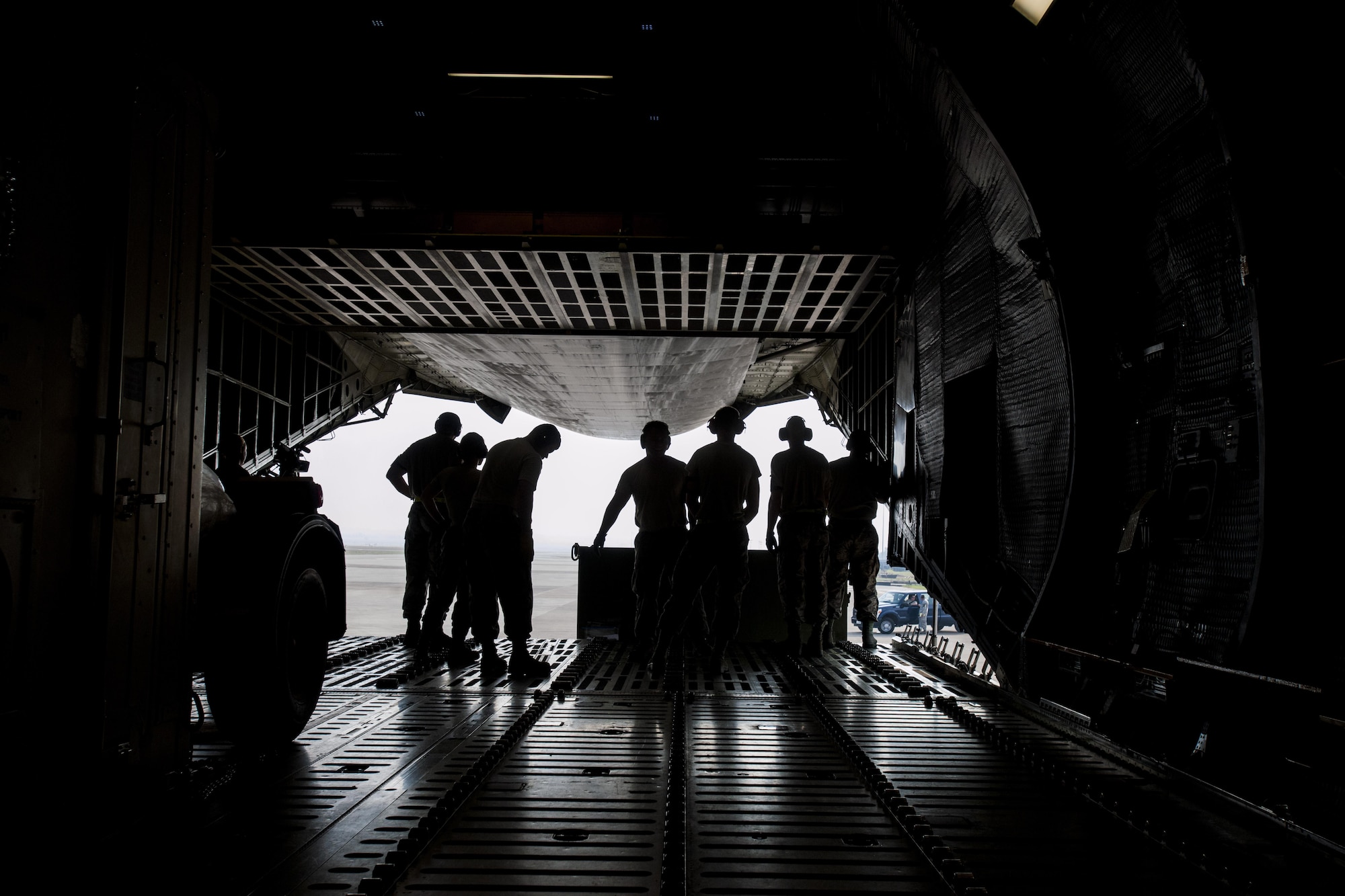 Airmen from the 39th Logistics Readiness Squadron, the 728th Air Mobility Squadron and the 9th Airlift Squadron unload equipment from a C-5M Super Galaxy from Dover Air Force Base, Del. in support of Operation Inherent Resolve Aug. 9, 2015, at Incirlik Air Base, Turkey. The U.S. and Turkey, as members of the 60-plus nation coalition, are committed to the fight against ISIL in pursuit of peace and stability in the region. (U.S. Air Force photo by Senior Airman Krystal Ardrey/Released)