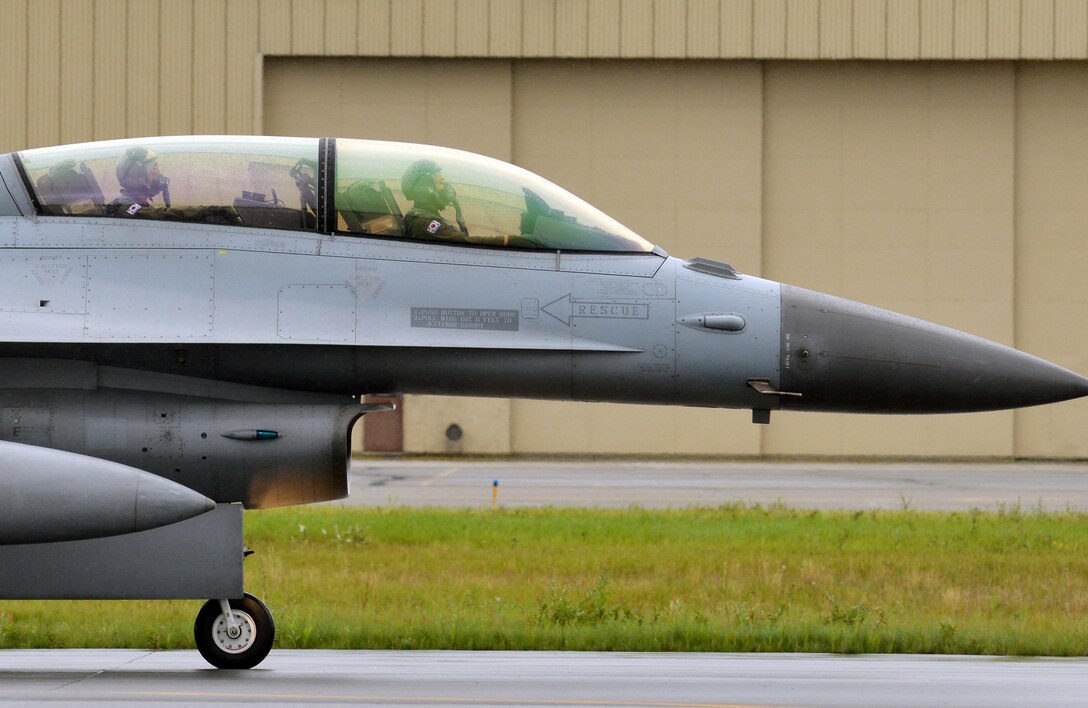 A Republic of Korea Air Force (ROKAF) F-16D taxis down the Eielson Air Force Base Alaska, flightline Aug. 10, 2015 as part of the first simulated combat sortie of RED FLAG-Alaska, 15-3.  The ROKAF is participating in this Pacific Air Forces commander-directed field training exercise for U.S. and partner nation forces, providing combined offensive counter-air, interdiction, close air support, and large force employment training in a simulated combat environment. (U.S. Air Force photo by Airman 1st Class Kyle Johnson/Released)