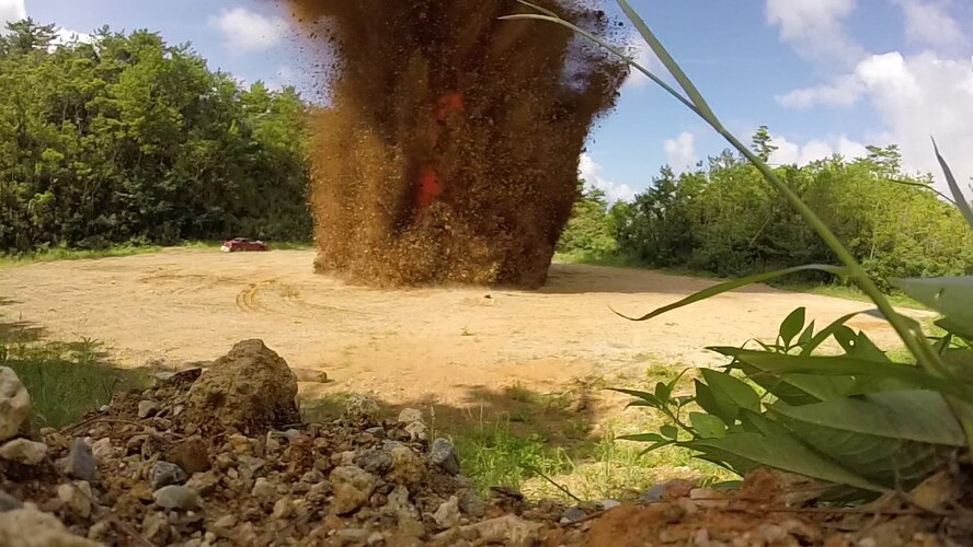 The 18th Civil Engineer Squadron Explosive Ordnance Disposal Flight destroys unserviceable munitions as well as unexploaded ordnance using 50 M112 Demolition blocks of C-4 explosives on Kadena Air Base, Japan, Aug. 12, 2015. The team routinely disposes of unserviceable munitions and recovered UXOs found on Kadena. (U.S. Air Force photo by Senior Airman Stephen G. Eigel)