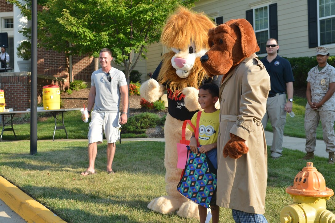 Daren the Lion and McGruff the Crime Dog, made an appearance during Marine Corps Base Quantico’s National Night Out on Aug 4. The event was held in front of the Lincoln Military Office aboard the base.