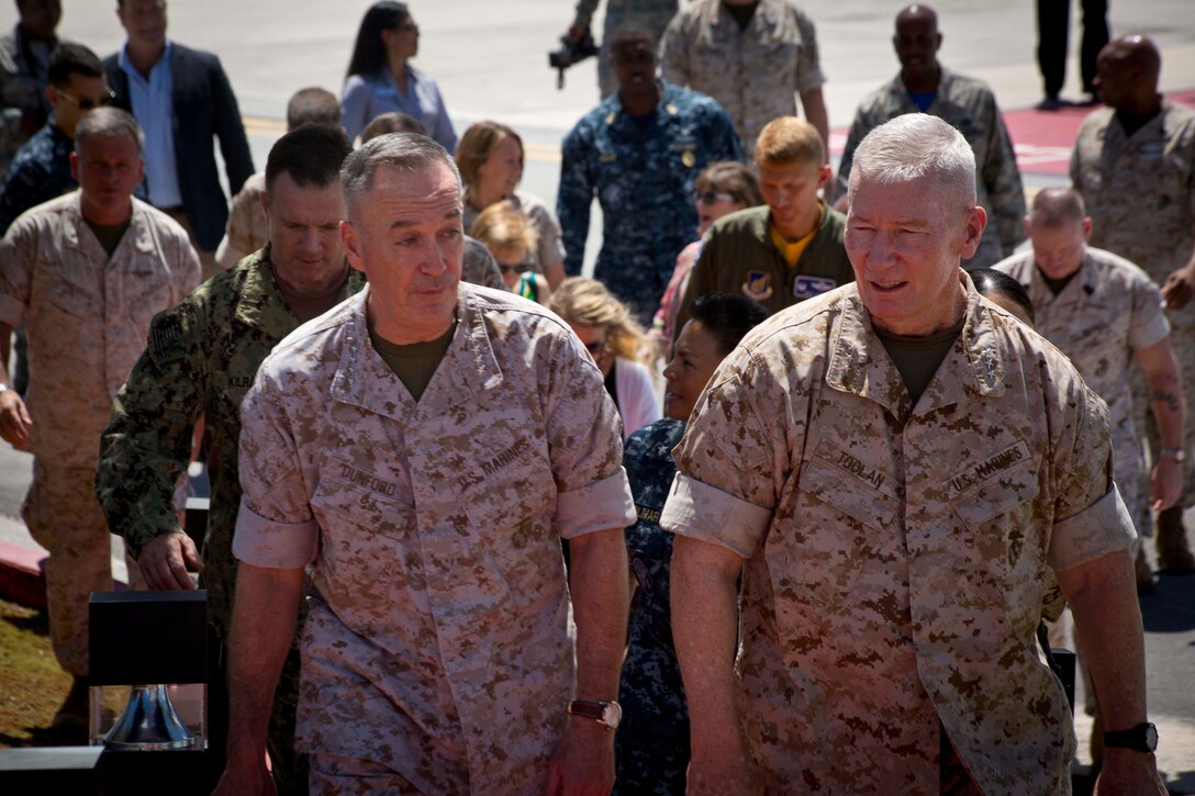 Commandant of the Marine Corps, Gen Joseph Dunford Jr.(left) and Lt.Gen. John Toolan (right), begin their tour around Guam, at Anderson Air Force Base, Yigo, Guam, March 20, 2015. Gen. Dunford visit brought him around the island to see the proposed sites and infrastructures for the Marine Corps (U.S. Marine Corps photo by Lance Cpl. Jacob Snouffer/Released)