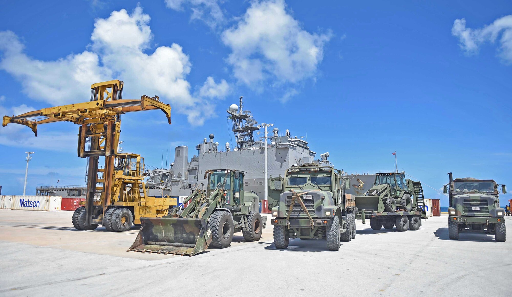 150812-N-KM939-099
SAIPAN HARBOR, Saipan (Aug. 12, 2015) - Marines from the 31st Marine Expeditionary Unit (MEU) stage vehicles in front of the amphibious dock landing ship USS Ashland (LSD 48), during disaster relief efforts in Saipan after Typhoon Soudelor. 31st MEU are embarked on the amphibious dock landing ship USS Ashland (LSD 48) and are on patrol in the U.S. 7th Fleet area of operations. (U.S. Navy photo by Mass Communication Specialist 3rd Class David A. Cox/Released)