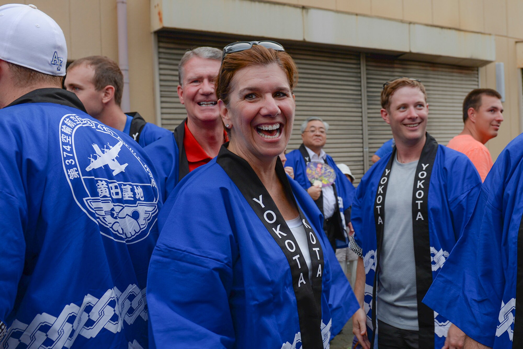 U.S. Air Force Gen. Lori Robinson, Pacific Air Forces commander, meets the Team Yokota members who are about to carry a mikoshi shrine through the streets in Fussa, Japan, Aug. 7, 2015. Carrying the shrine was part of the Tanabada festival, one of Yokota’s most prominent bilateral events. (U.S. Air Force photo by Airman 1st Class Elizabeth Baker/Released) 