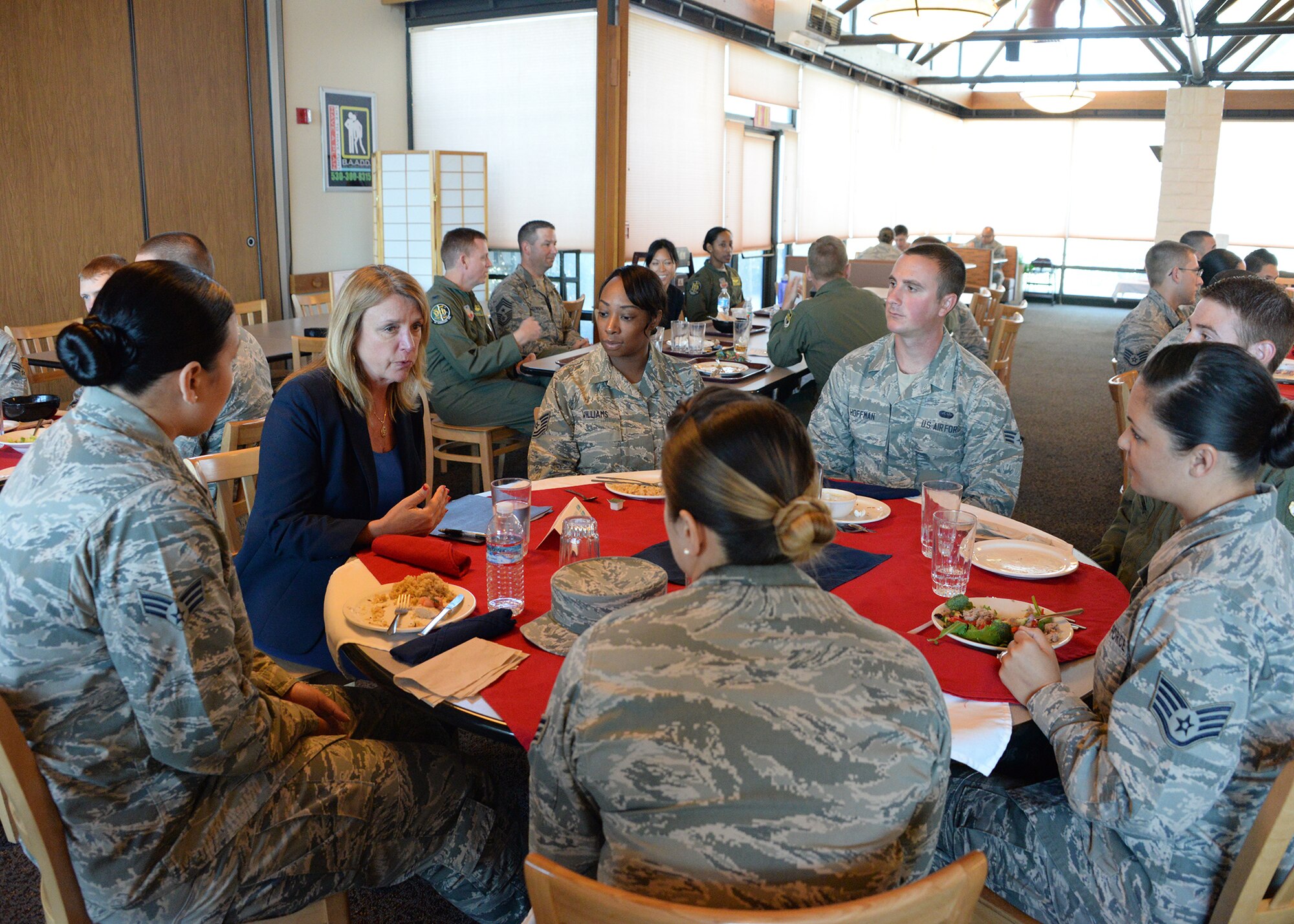 Secretary of the Air Force Deborah Lee James speaks with Airmen about a variety of issues during a lunch at Beale Air Force Base, California, Aug. 10, 2015. James visited Beale to receive a first-hand perspective of high-altitude intelligence, surveillance and reconnaissance from collection to dissemination. (U.S. Air Force photo by Robert Scott)