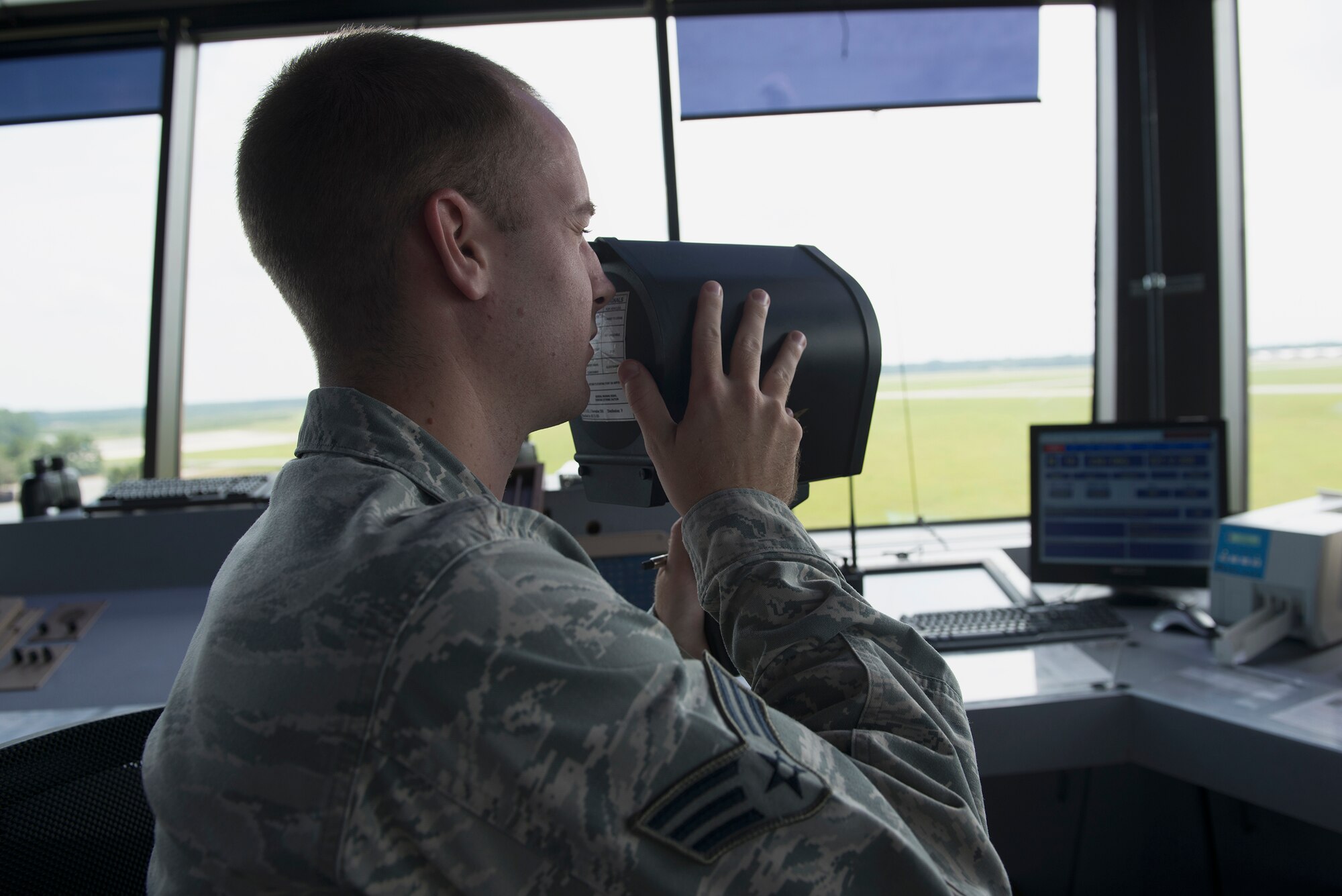 U.S. Air Force Senior Airman Tyler Shelton, 23d Operation Support Squadron air traffic control journeyman, tests a light gun Aug. 11, 2015, at Moody Air Force Base, Ga. Light guns are used to direct aircraft if radio communication fails in and out of the airfield. (U.S. Air Force photo by Airman 1st Class Kathleen D. Bryant/Released)

