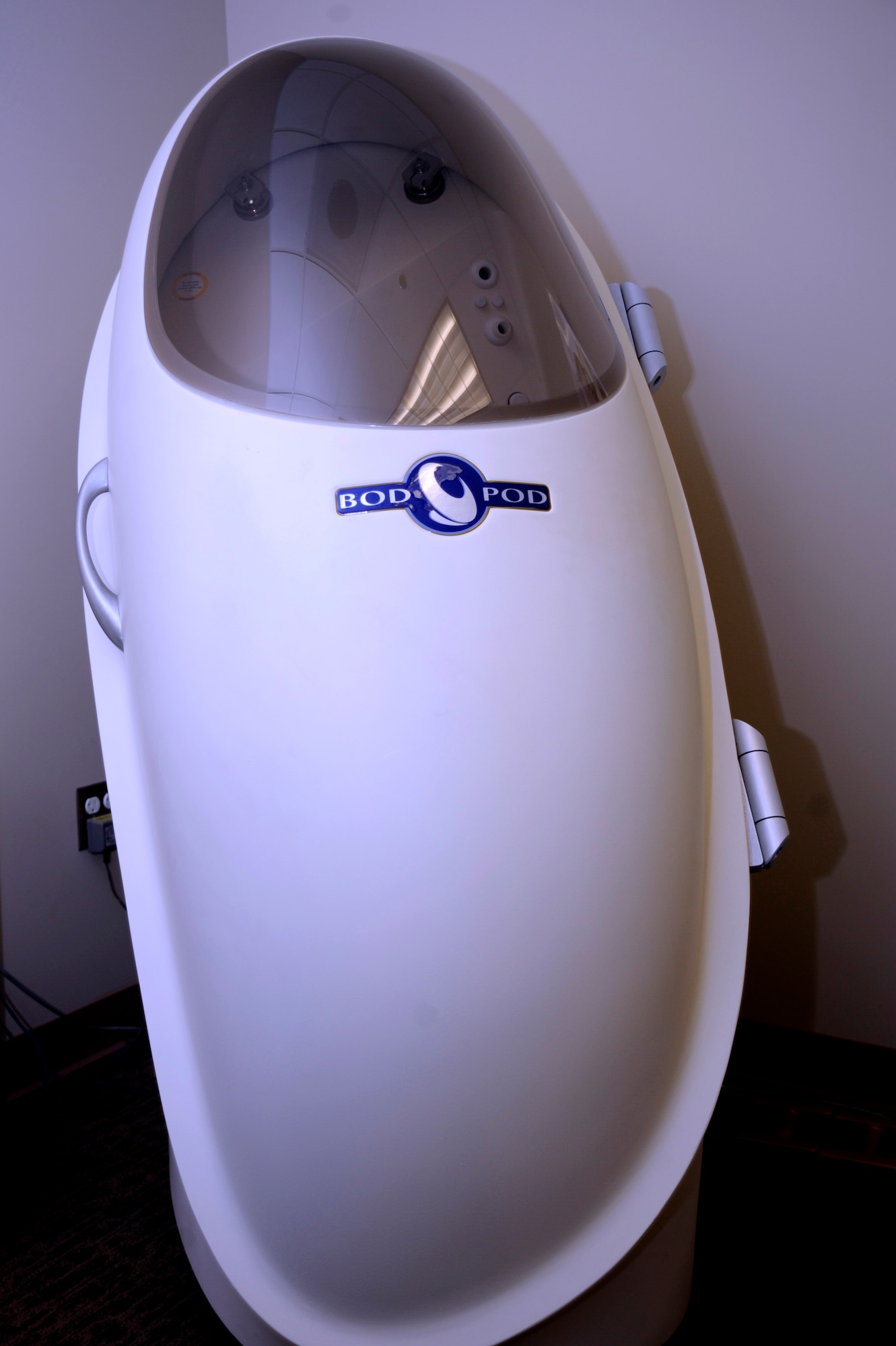 The 30th Medical Group’s Bod Pod waits to be used, Aug. 5, 2015, Vandenberg Air Force Base, Calif. Since its inception more than six decades ago, the Air Force has continuously looked for innovative ways to keep Airmen fit. Merging the traditional desire for a fit force with modern medical technology, the 30th MDG maintains a piece of equipment known as the Bod Pod – which gives users an accurate, under-the-skin health synopsis. (U.S. Air Force photo by Airman 1st Class Robert J. Volio/Released)