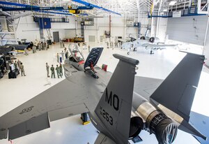 Airmen from Gowen Field and Mountain Home Air Force Base gather in a hangar at Gowen Field ,Boise, Idaho, Aug. 12, 2015. The 124th and 366th Fighter Wings have worked closely while the Gunfighters undergo runway construction at their home station. (U.S. Air Force photo by Airman 1st Class Jessica H. Evans/RELEASED)