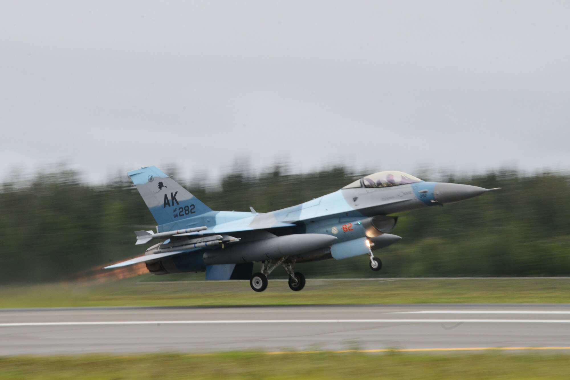 A U.S. Air Force F-16 Fighting Falcon assigned to the 18th Aggressor Squadron takes off from Eielson Air Force Base, Alaska, Aug. 10, 2015, during RED FLAG-Alaska (RF-A) 15-3. RF-A is a series of Pacific Air Forces commander-directed field training exercises for U.S. and partner nation forces, providing combined offensive counter-air, interdiction, close air support and large force employment training in a simulated combat environment. (U.S. Air Force photo by Senior Airman Ashley Nicole Taylor/Released)
