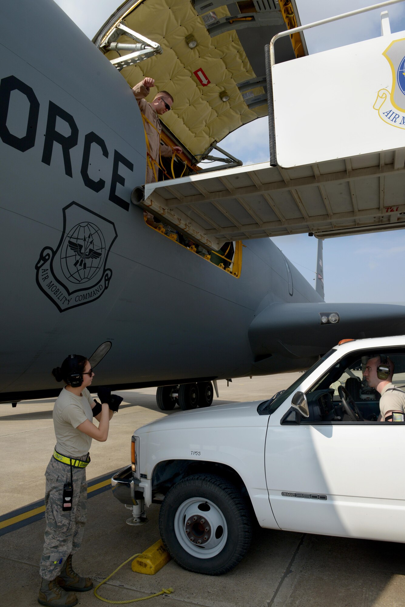 Airmen from the 92nd Air Refueling Squadron and 728th Air Mobility Squadron prepare to unload cargo from a KC-135 Stratotanker in support of Operation Inherent Resolve Aug. 10, 2015, at Incirlik Air Base, Turkey. This follows Turkey’s decision to host the deployment of U.S. aircraft conducting counter-ISIL operations. (U.S. Air Force photo Senior Airman Krystal Ardrey/Released)