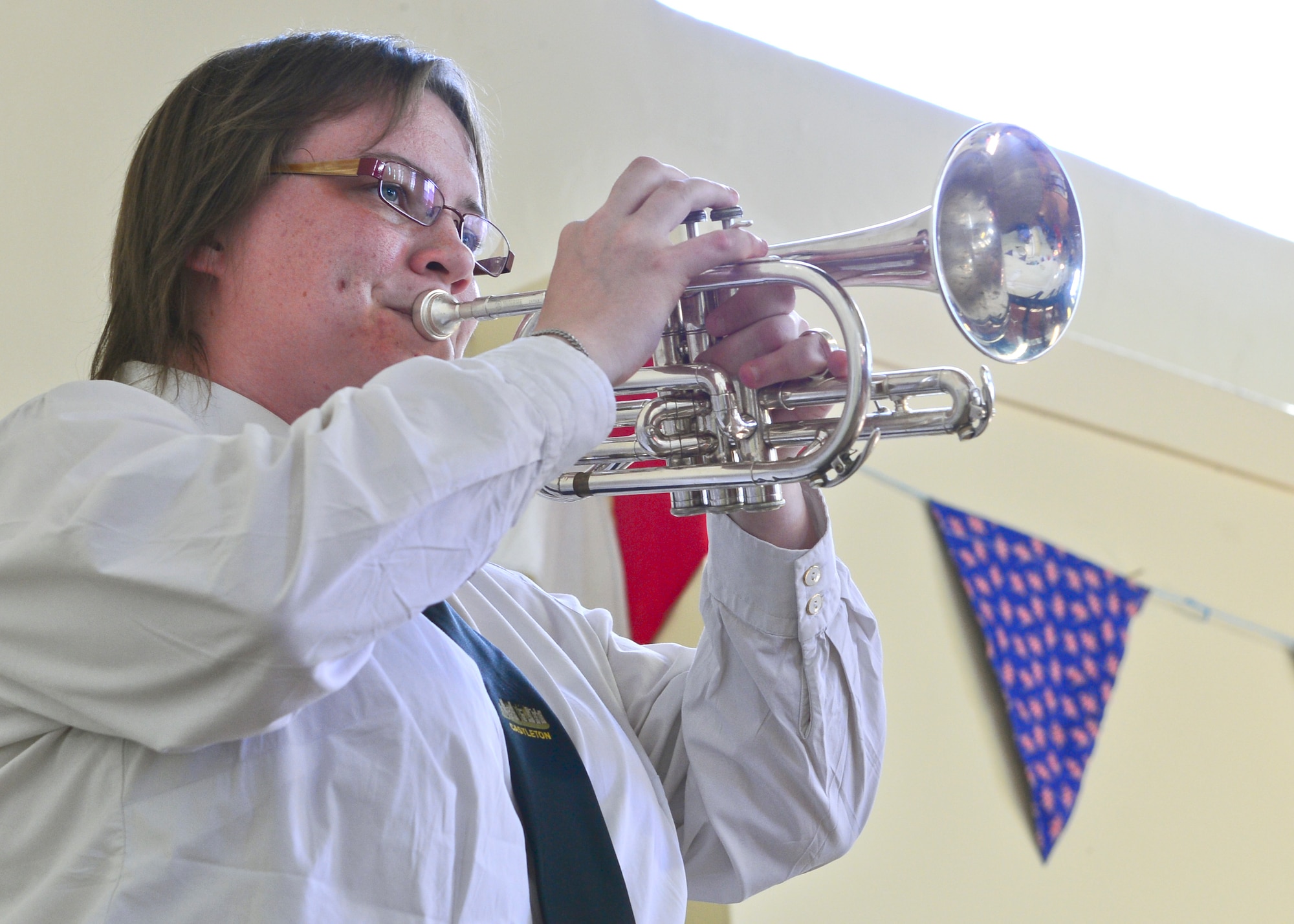 Taps is played following a remembrance ceremony for the 490th Bombardment Group in Eye, England, Aug. 9, 2015. Taps, unique to the U.S. military, is played at burial and memorial services, to accompany the lowering of the flag and to signal the “lights out” command at day’s end. (U.S. Air Force photo by Senior Airman Dawn M. Weber/Released)
