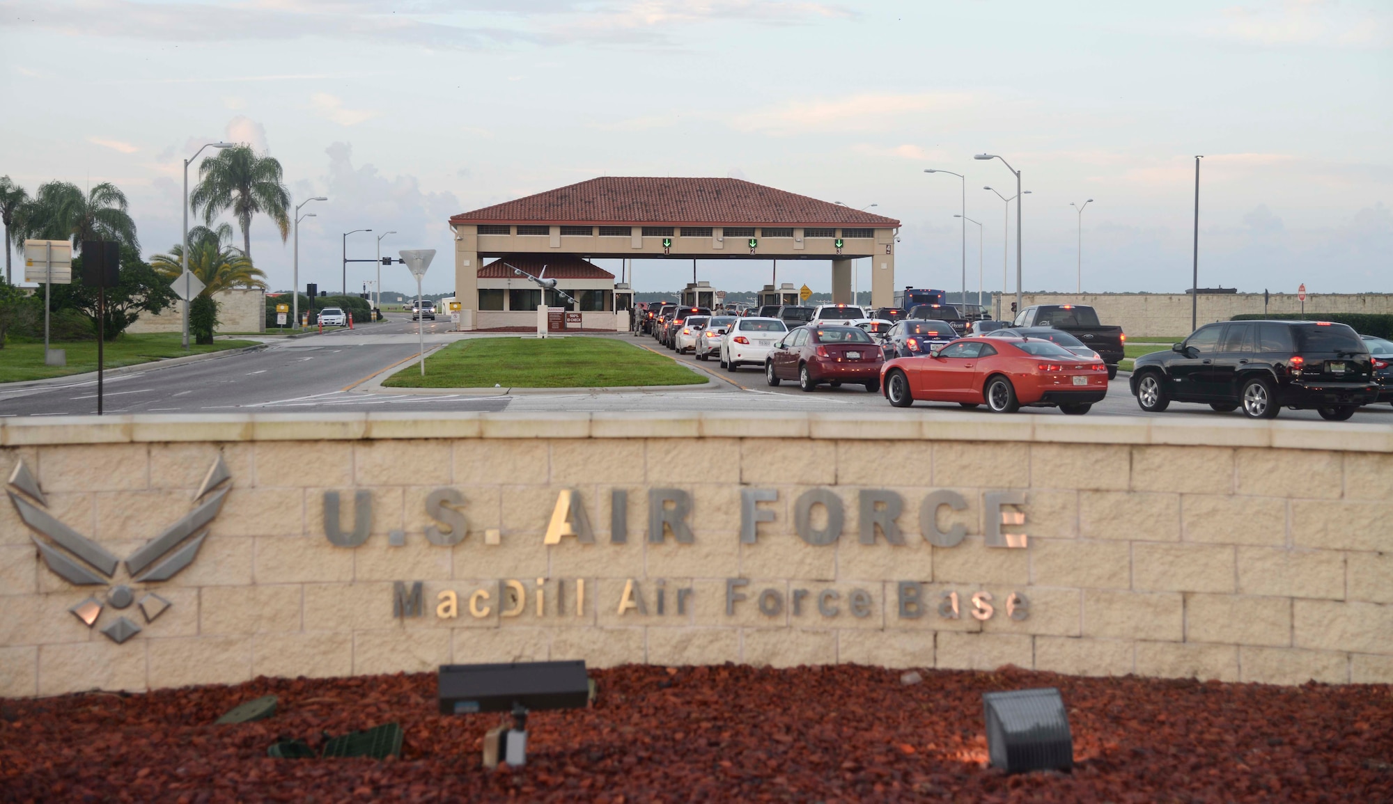 Privately owned vehicles wait to enter through the Dale Mabry gate at MacDill Air Force Base, Fla., Aug. 12, 2015. Gate Traffic has been a hot topic for MacDill AFB this year. (U.S. Air Force photo by Senior Airman Vernon L. Fowler Jr./Released)