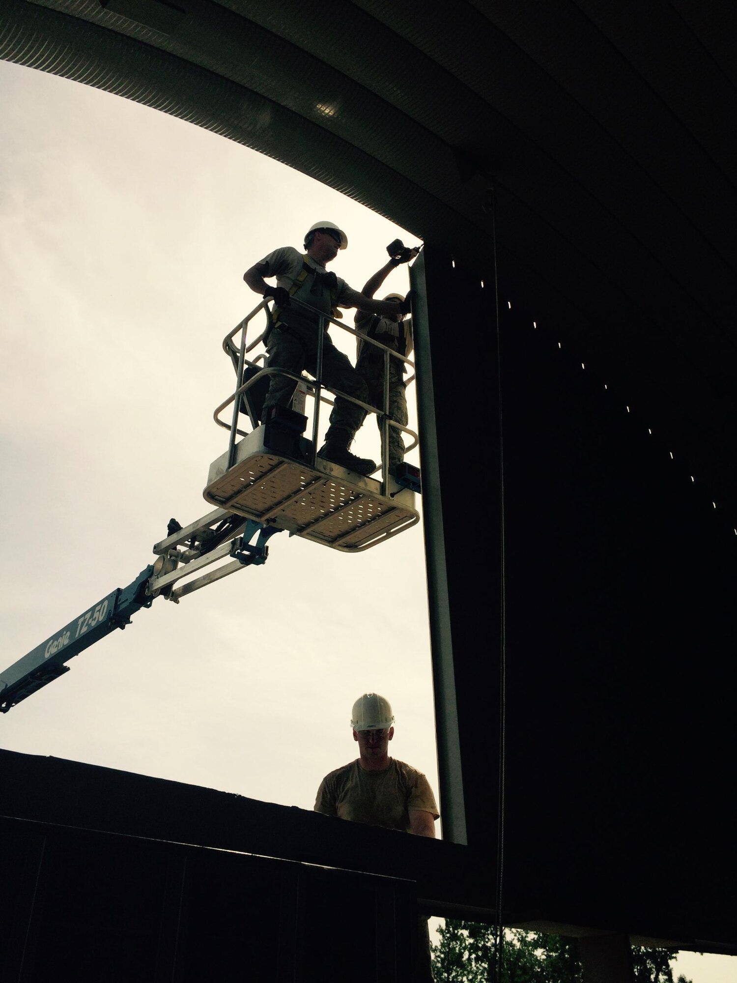 Members of the 138th Civil Engineer Squadron, Tulsa, Okla; install side wall panels on the new Service Support building at the 145th Regional Training Site, New London, N.C., June 26, 2015. 145th and 138th civil engineers participated in a Deployment for Training program that provides contingency type training and gives airmen invaluable hands-on experience that cannot be matched in a traditional drill weekend at home station. (Air National Guard photo courtesy of 138th Civil Engineer Squadron/Released)