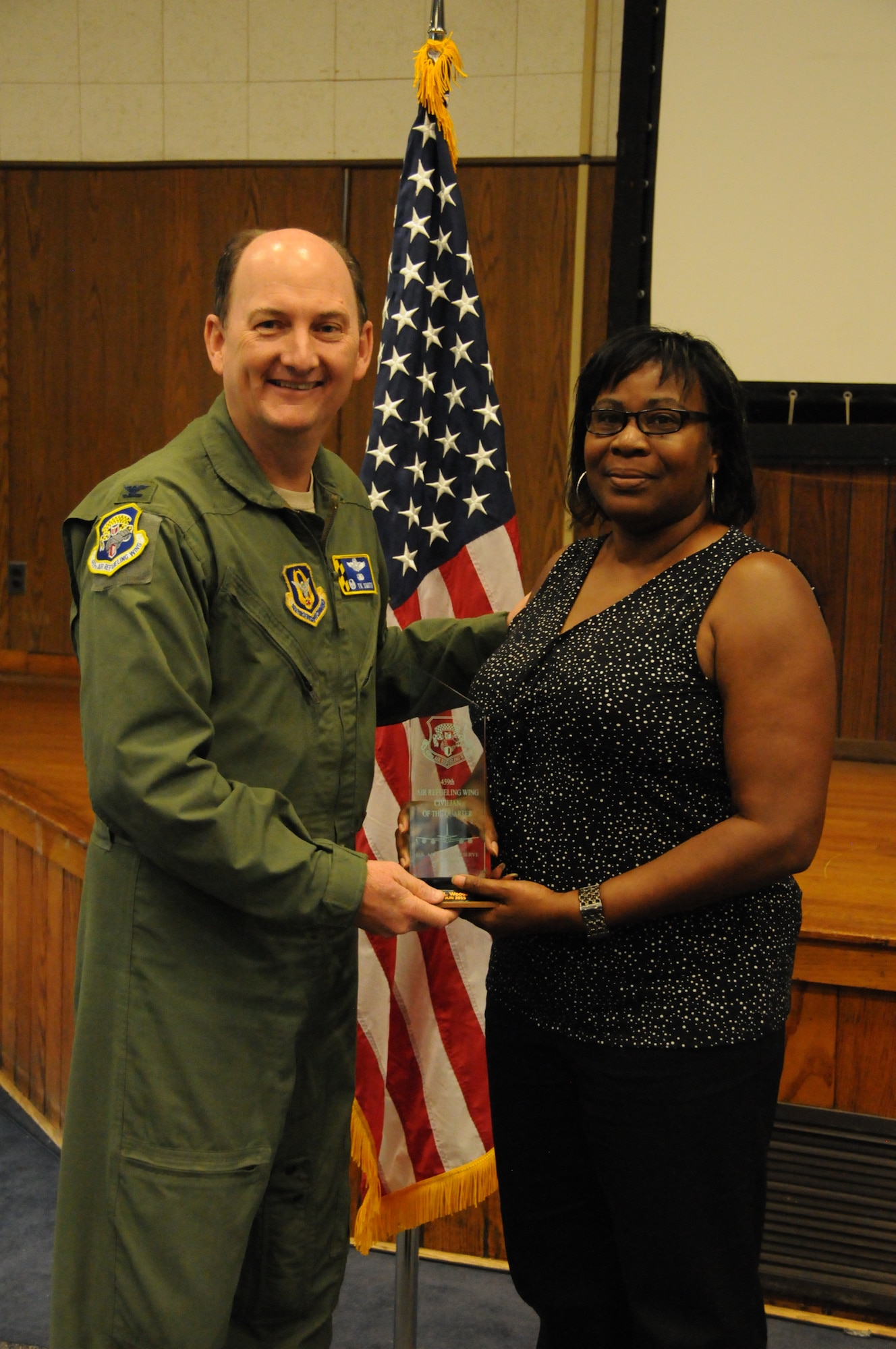 Ms. Brenda Woodard wins 459 ARW Civilian of the Quarter for Apr - Jun 2015.