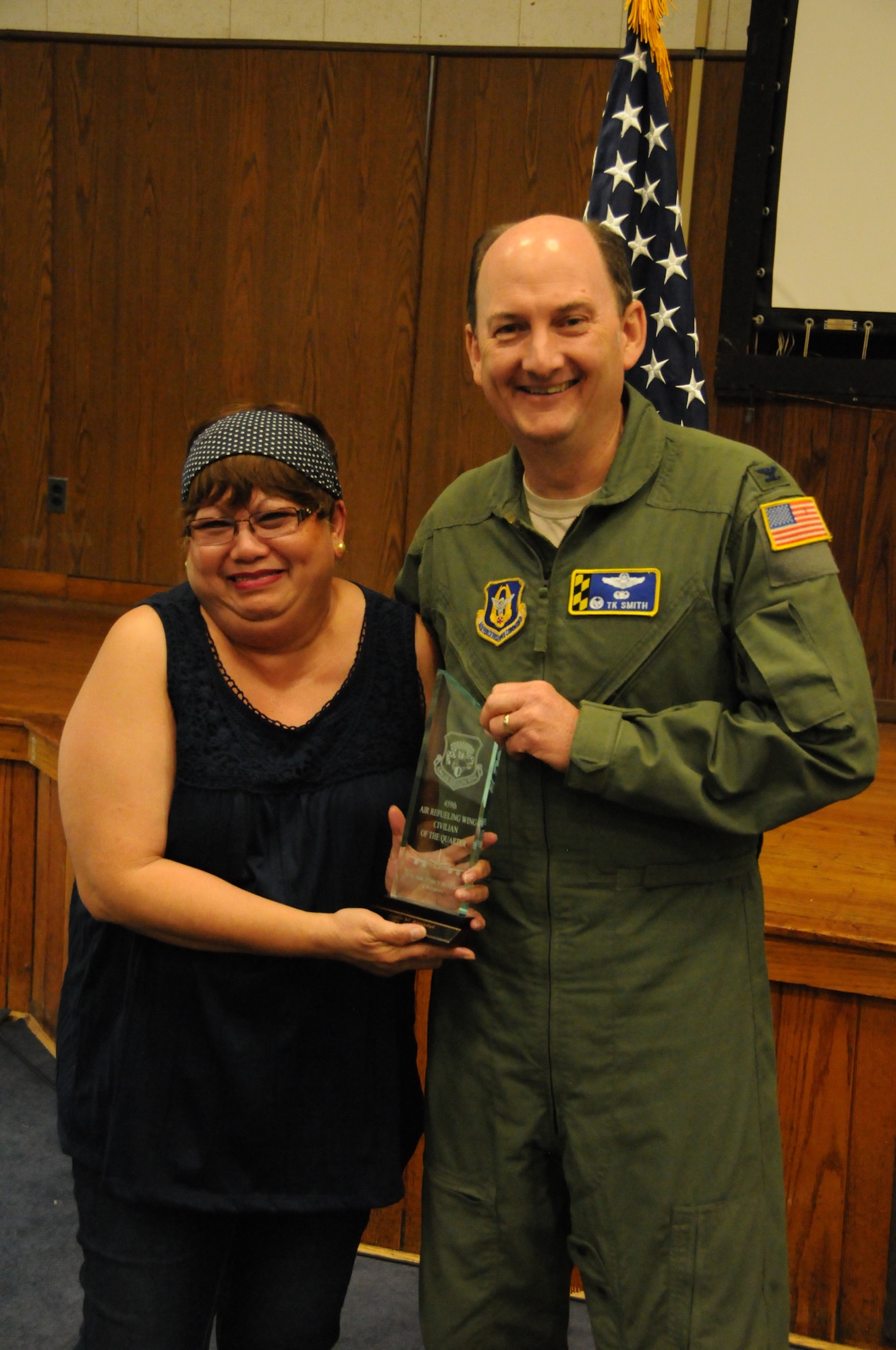 Ms. Gloria Almodiel wins 459 ARW Civilian of the Quarter for Jan - Mar 2015.