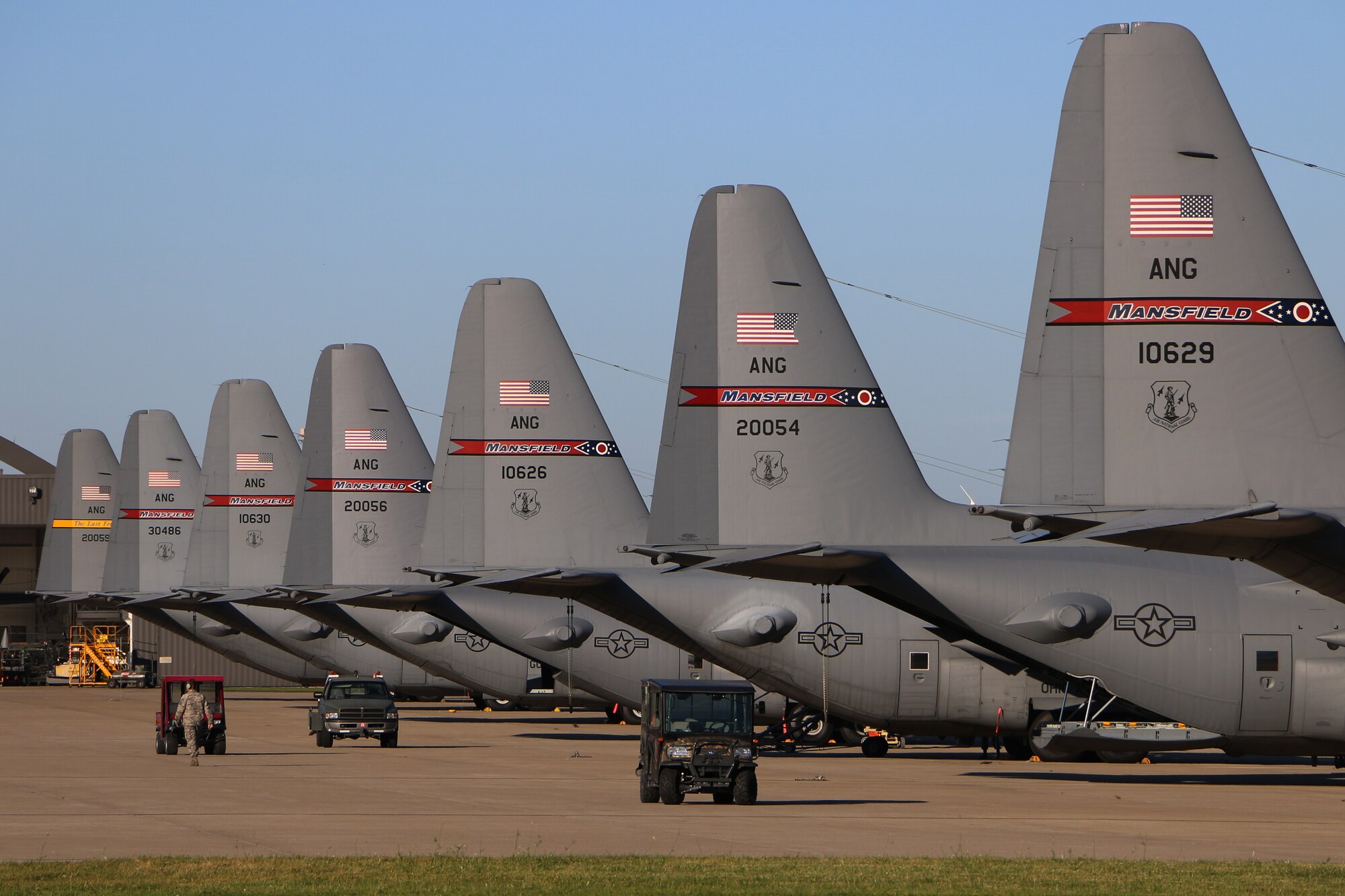 Eight C-130H Hercules fill the fleet at the 179th Airlift Wing, Mansfield, Ohio, Aug. 4, 2015. The Ohio Air National Guard unit is always on mission to respond with highly qualified citizen-airmen to execute Federal, State and community missions . (U.S. Air National Guard photo by Tech. Sgt. Joe Harwood\Released)