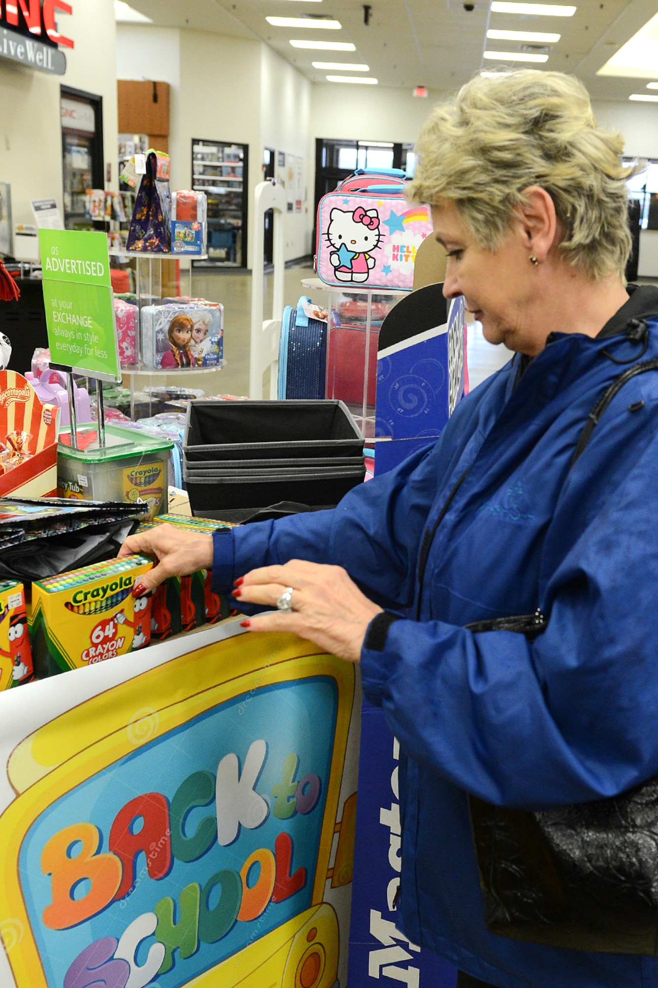 Natalija O’Loughlin shops for school supplies for her granddaughter at the Hanscom Army and Air Force Exchange Aug. 11. The first day of school for students attending Hanscom Primary and Middle Schools in first through eighth grade is Aug. 31. Bedford High School students and Hanscom pre-school and kindergarten students begin school Sept. 1. (U.S. Air Force photo by Jerry Saslav)