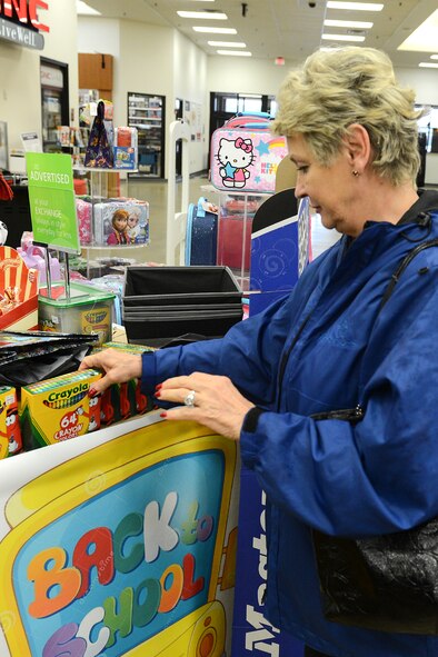 Natalija O’Loughlin shops for school supplies for her granddaughter at the Hanscom Army and Air Force Exchange Aug. 11. The first day of school for students attending Hanscom Primary and Middle Schools in first through eighth grade is Aug. 31. Bedford High School students and Hanscom pre-school and kindergarten students begin school Sept. 1. (U.S. Air Force photo by Jerry Saslav)