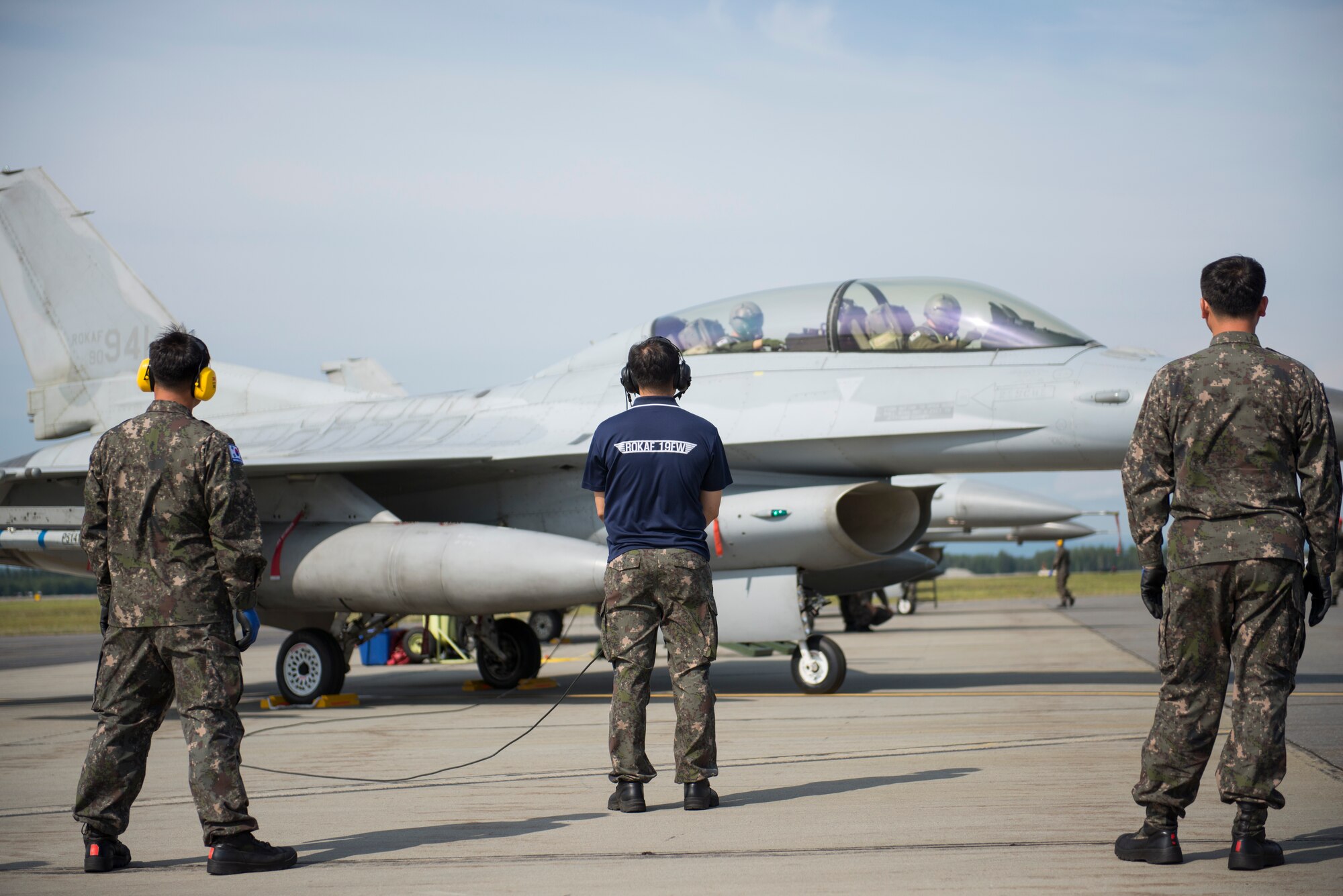 Members of the Republic of Korea Air Force (ROKAF) inspect their F-16D Fighting Falcon prior to launch at Eielson Air Force Base, Alaska, Aug. 4, 2015. The ROKAF is participating in RED FLAG-Alaska 15-3, a Pacific Air Forces commander-directed field training exercise for U.S. and partner nation forces, providing combined offensive counter-air, interdiction, close air support and large force employment training in a simulated combat environment. (U.S. Air Force photo by 1Lt Elias Zani/ Released)