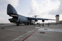 Airmen from the 39th Logistics Readiness Squadron and the 728th Air Mobility Squadron depart from a C-5M Super Galaxy from Dover Air Force Base, Del. in support of Operation Inherent Resolve Aug. 9, 2015, at Incirlik Air Base, Turkey. The U.S. and Turkey, as members of the 60-plus nation coalition, are committed to the fight against ISIL in pursuit of peace and stability in the region. (U.S. Air Force photo by Senior Airman Krystal Ardrey/Released) 