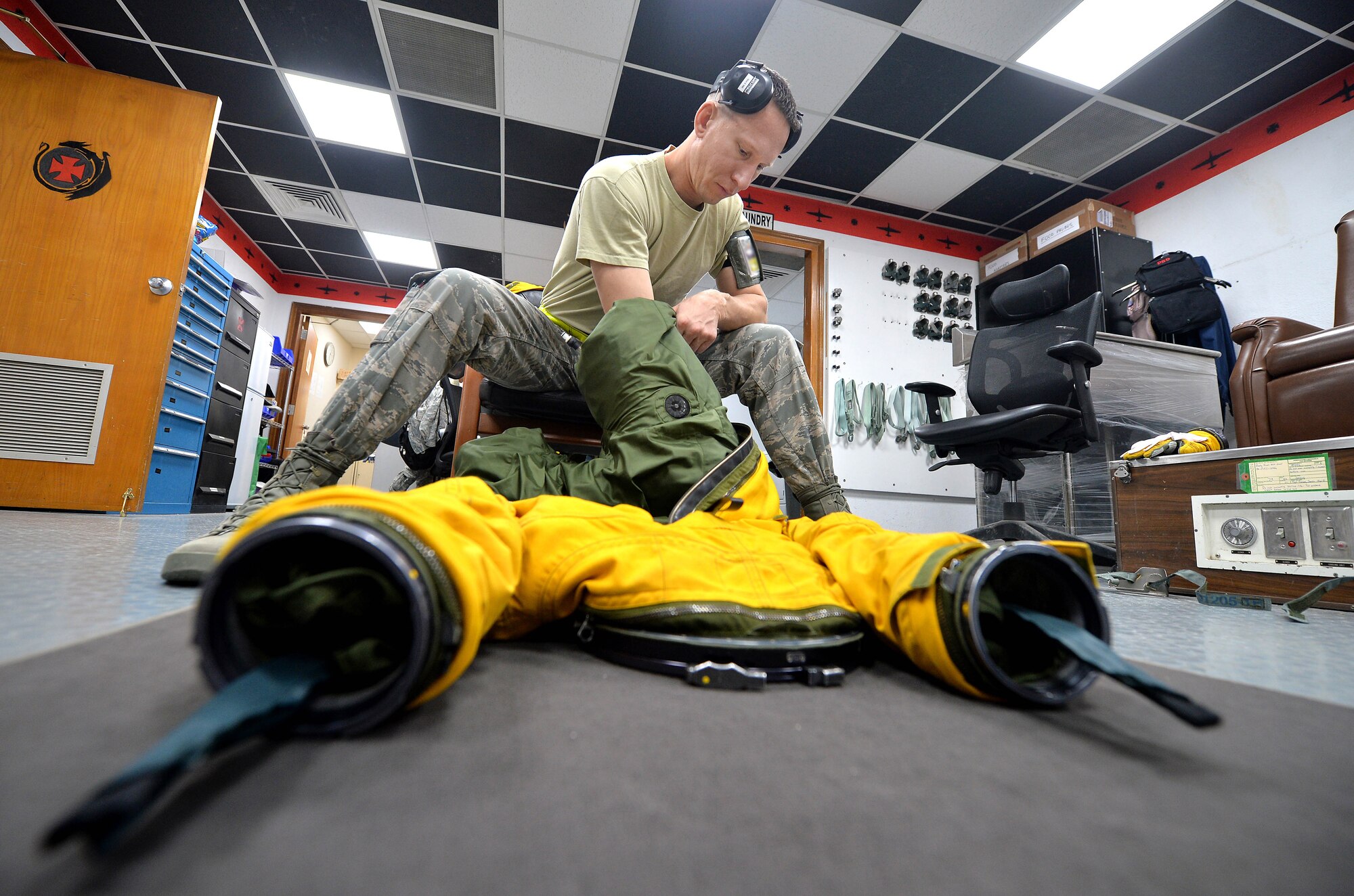 Master Sgt. Jeremy, Expeditionary Reconnaissance Squadron physiology support supervisor, prepares a U-2 full pressure suit at an undisclosed location in Southwest Asia Aug. 7, 2015. The physiological support detachment team is responsible for maintaining the U-2 full pressure suit, ensuring it functions properly and assisting pilots with donning the gear. (U.S. Air Force photo/Tech. Sgt. Jeff Andrejcik)