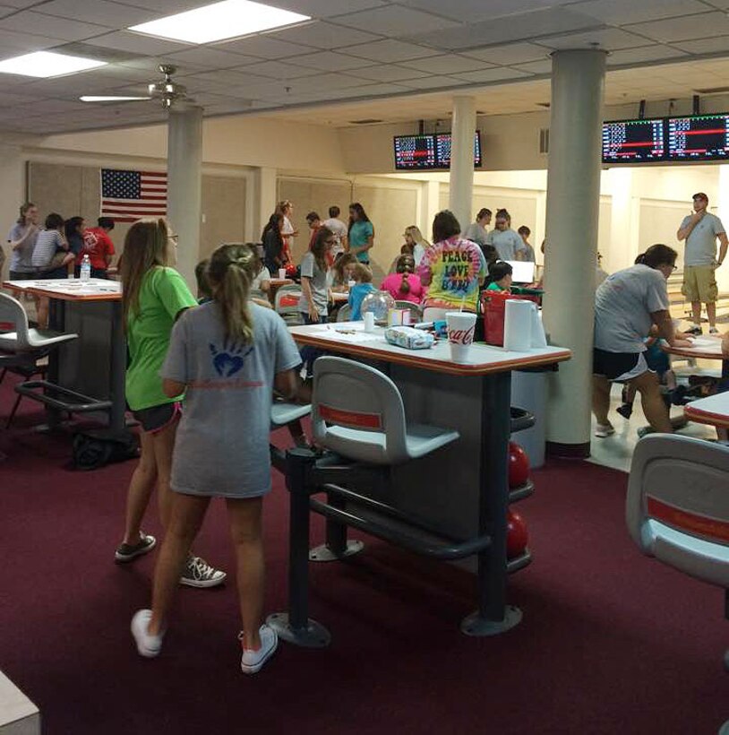 Marine Corps Community Services’ Exceptional Family Member Program staff at Marine Corps Logistics Base Albany partners with the Challenger League during its weeklong youth summer day camp, recently. Jennifer Sapp, director/founder, Challenger League, Albany, Ga., and her group of children and volunteers spent the day bowling at Pin City Bowling Center, here, during their “bowling day” activity. The event was one of five scheduled for special needs children participating in the camp.