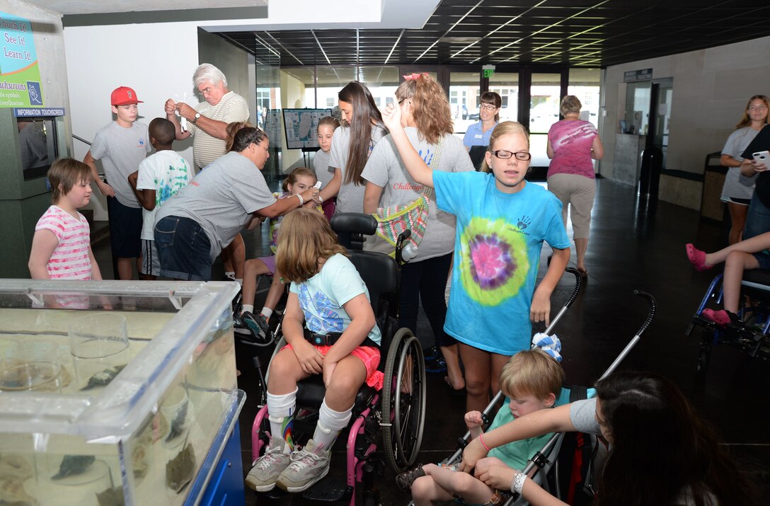 Marine Corps Community Services’ Exceptional Family Member Program staff at Marine Corps Logistics Base Albany partners with the Challenger League during its weeklong youth summer day camp. Jennifer Sapp, director/founder, Challenger League, Albany, Ga., and her group of children and volunteers spent a day of bowling at MCLB Albany’s Pin City Bowling Center and a day at the Flint RiverQuarium, Albany, Ga., recently. Both events were part of five activities scheduled for special needs children participating in the camp.