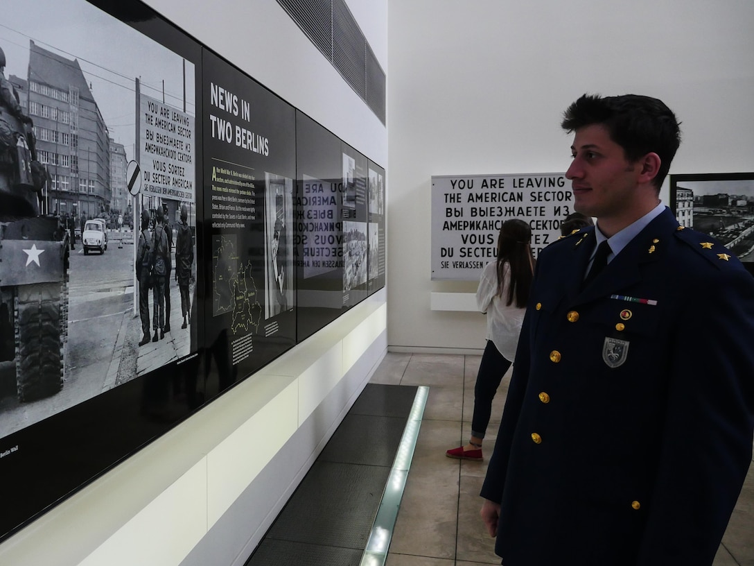 Turkey air force Lieutenant Ugur Ziyal, observes a display at the Newseum in Washington, D.C. Ziyal was a part of the April Public Affairs Course for International Students. As part of the course, international students visited various governmental organizations and historical landmarks. (DoD photo by Joseph Coslett)