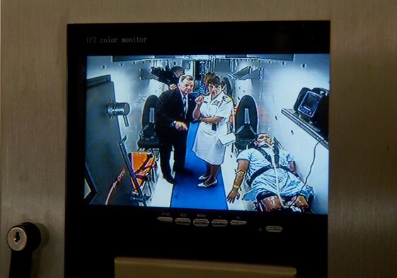 A viewing monitor at the entrance of the Department of State's Containerized Biocontainment System allows viewing of activities in the container. Tours were conducted after an unveiling ceremony for the systems held at Dobbins Air Reserve Base, Ga. Aug. 11, 2015. (U.S. Air Force photo/Don Peek)