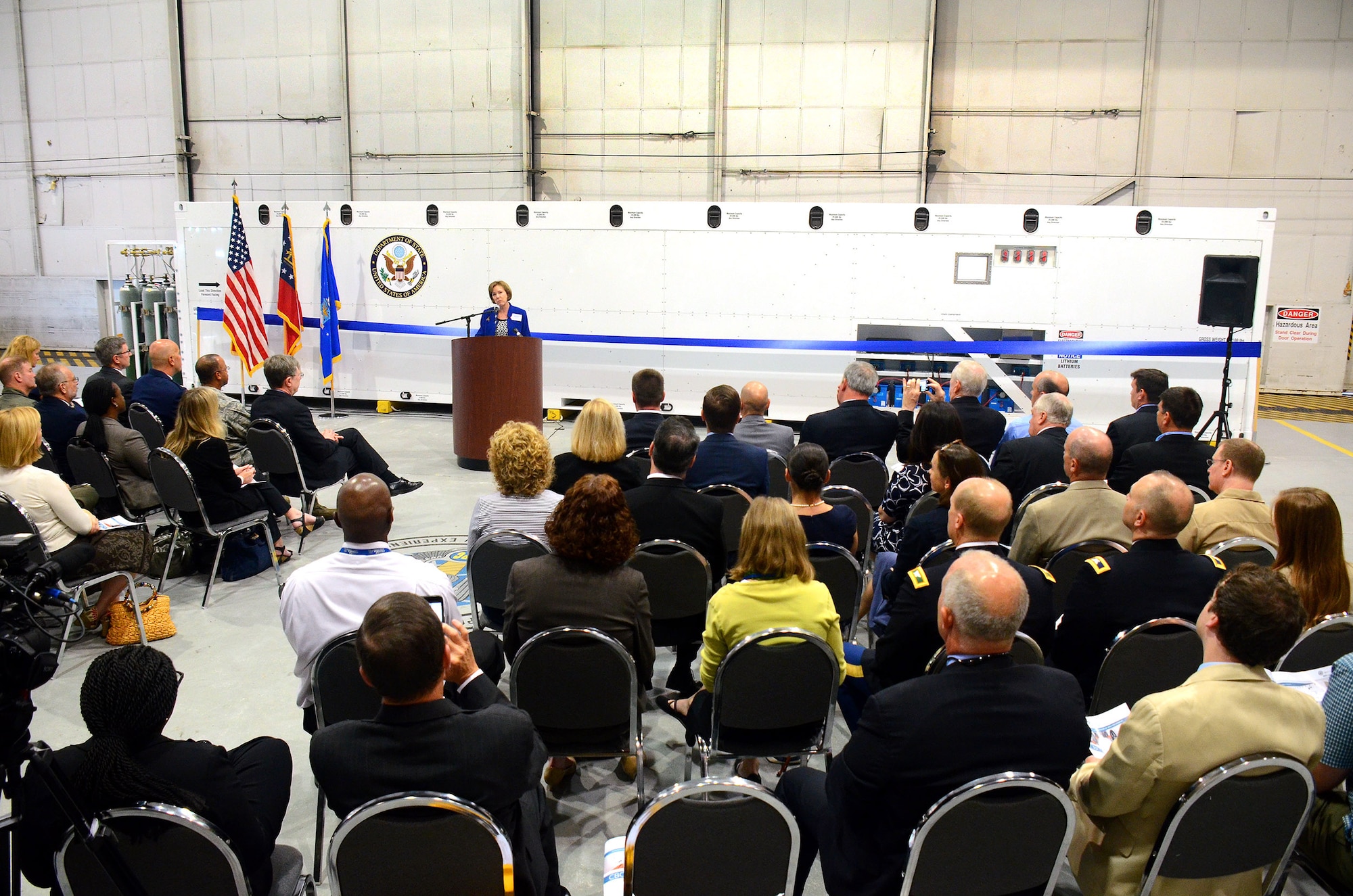 Barbara Bennett, president and chief operating officer Vulcan Inc., speaks at the unveiling of the US State Department sponsored Containerized Biocontainment Systems units at Dobbins Air Reserve Base, Ga., Aug. 11, 2015. The two Containerized Biocontainment units built by MRIGlobal through a partnership with the U.S. State Dept. and the Paul G. Allen Ebola Program, will be positioned at Dobbins ARB, ready for future. (U.S. Air Force photo/ Brad Fallin)