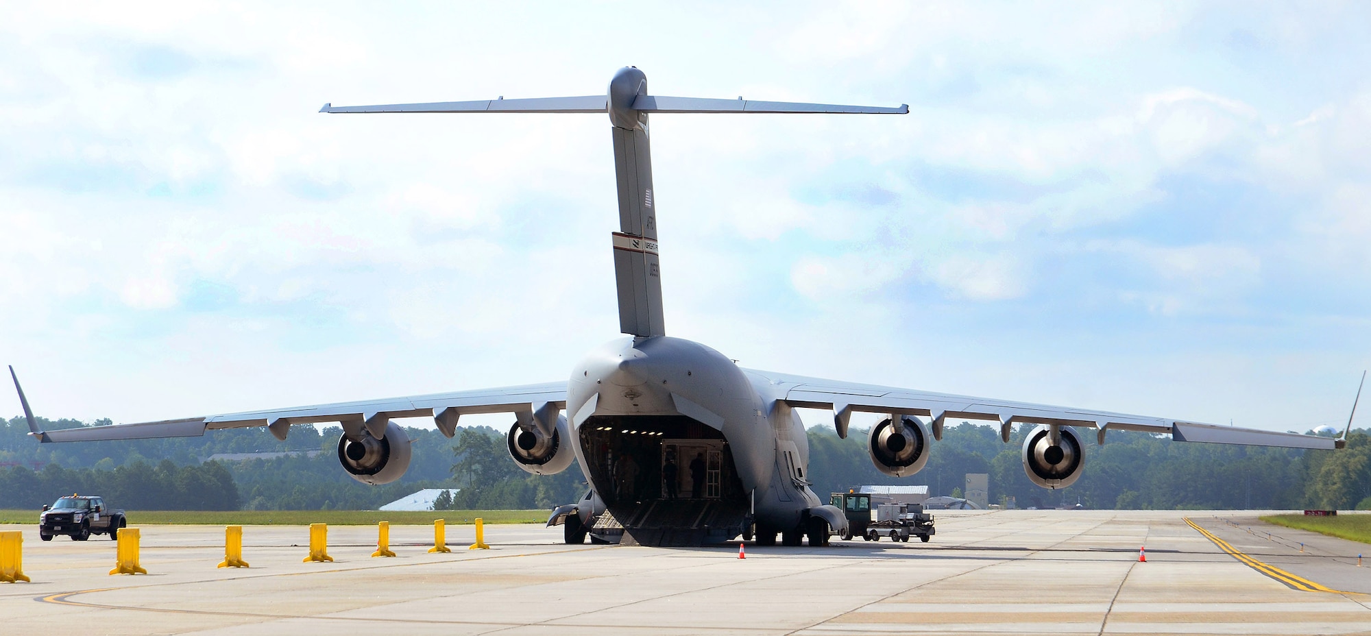 The second Containerized Biocontainment Systems unit was loaded into a U.S. Air Force C-17 to provide an example of how the unit could be airlifted to anywhere in the world if needed, Dobbins Air Reserve Base, Ga., Aug. 11, 2015. The two Containerized Biocontainment units built by MRIGlobal through a partnership with the U.S. State Dept. and the Paul G. Allen Ebola Program, will be positioned at Dobbins ARB, ready for future. (U.S. Air Force photo/ Brad Fallin)