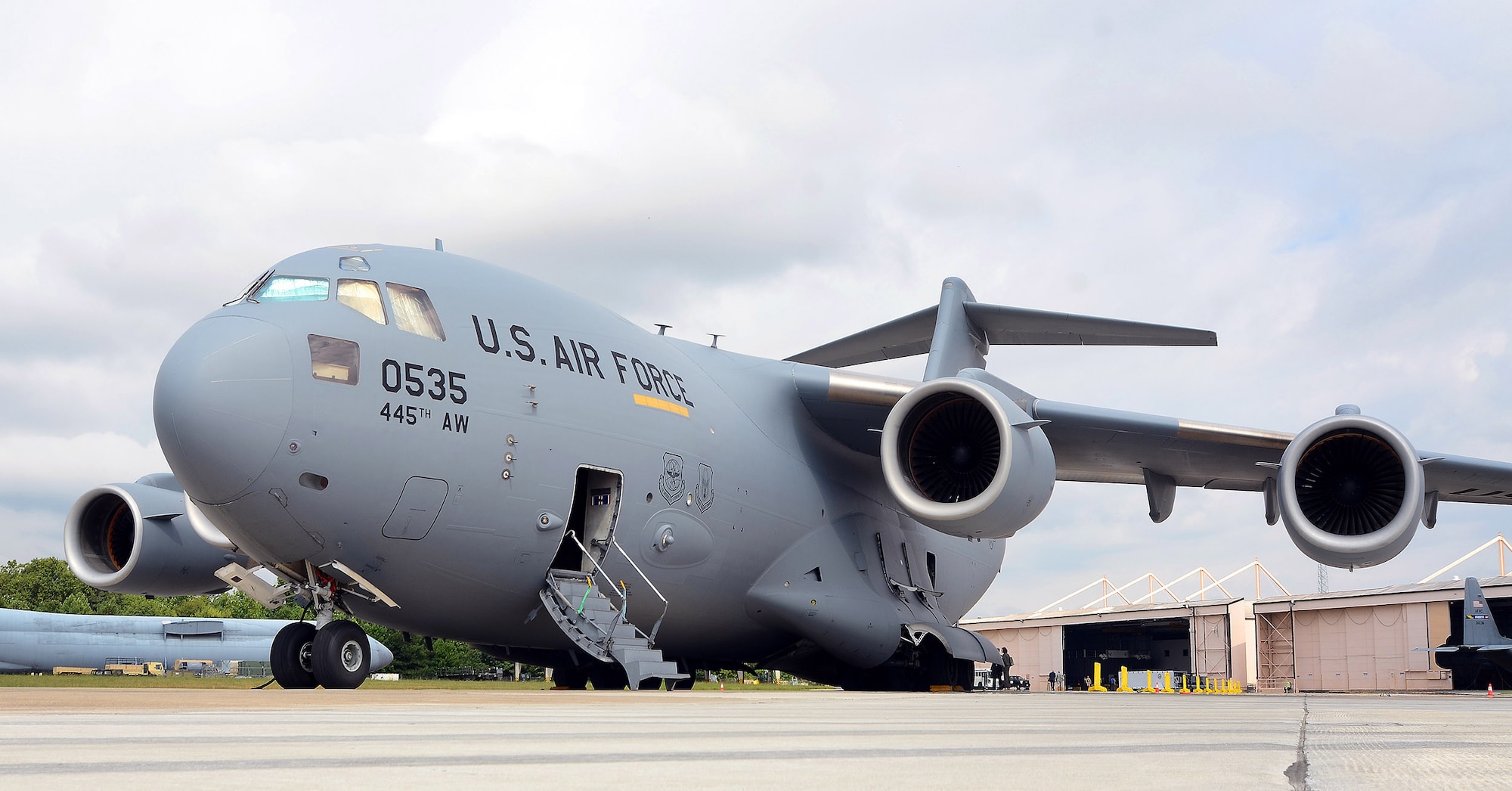 The second Containerized Biocontainment Systems unit is positioned on a U.S. Air Force C-17 to show how the unit could be airlifted to anywhere in the world if needed; Dobbins Air Reserve Base, Ga., Aug. 11, 2015. The two Containerized Biocontainment units were built by MRIGlobal through a partnership with the U.S. State Dept. and the Paul G. Allen Ebola Program and will be positioned at Dobbins ARB, ready for future. (U.S. Air Force photo/ Brad Fallin)