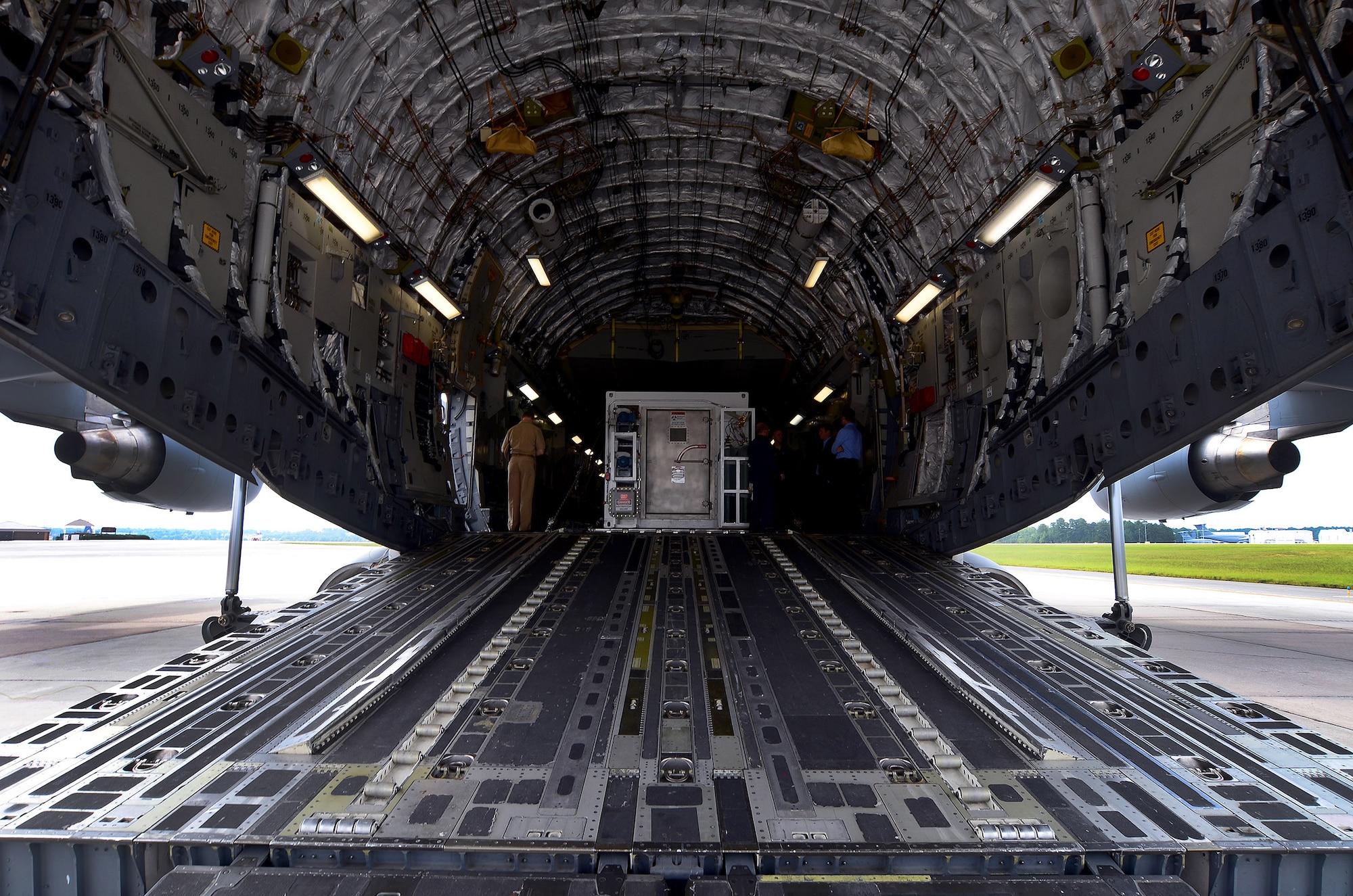 The second Containerized Biocontainment Systems unit is positioned on a U.S. Air Force C-17 to show how the unit could be airlifted to anywhere in the world if needed; Dobbins Air Reserve Base, Ga., Aug. 11, 2015. The two Containerized Biocontainment units were built by MRIGlobal through a partnership with the U.S. State Dept. and the Paul G. Allen Ebola Program and will be positioned at Dobbins ARB, ready for future. (U.S. Air Force photo/ Brad Fallin)