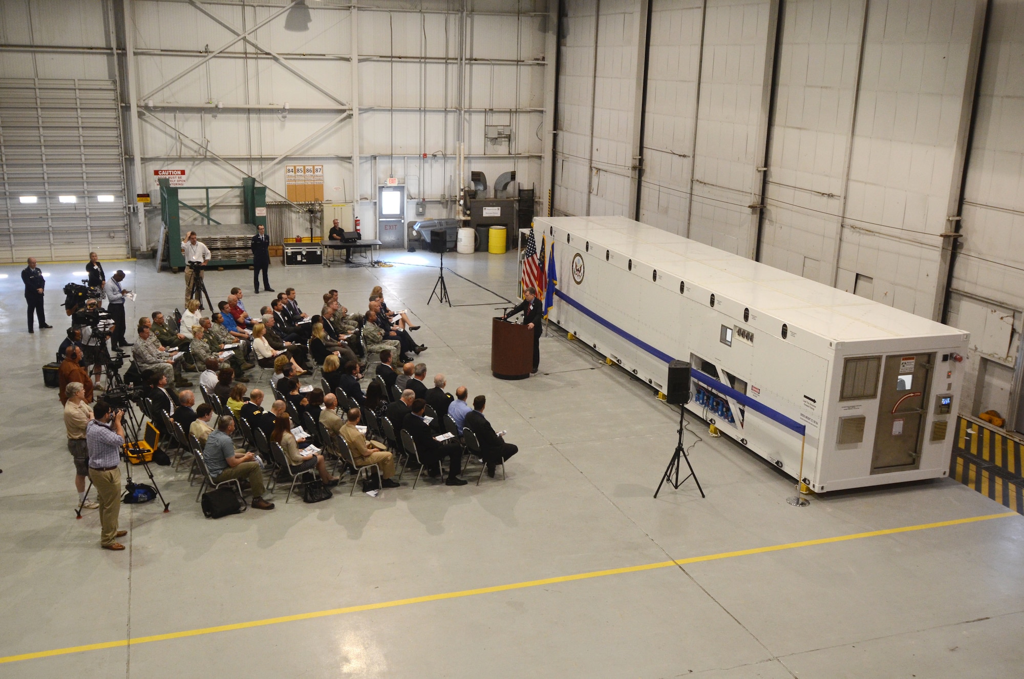 Patrick Kennedy, Under Secretary of Management from the United States Department of State, addresses an audience of personnel from the Department of State, MRI Global, Paul Allen Foundation and members of the 94th Airlift Wing at an unveiling of the DOS Containerized Biocontainment System held at Dobbins Air Reserve Base, Ga. Aug. 11, 2015. (U.S. Air Force photo/Don Peek)