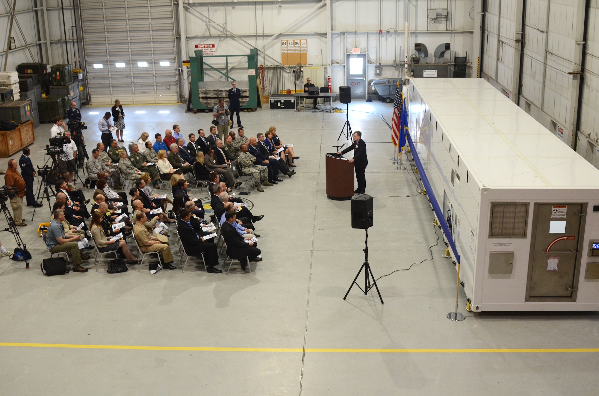 Patrick Kennedy, Under Secretary of Management from the United States Department of State, addresses an audience of personnel from the Department of State, MRI Global, Paul Allen Foundation and members of the 94th Airlift Wing at an unveiling of the DOS Containerized Biocontainment System held at Dobbins Air Reserve Base, Ga. Aug. 11, 2015. (U.S. Air Force photo/Don Peek)