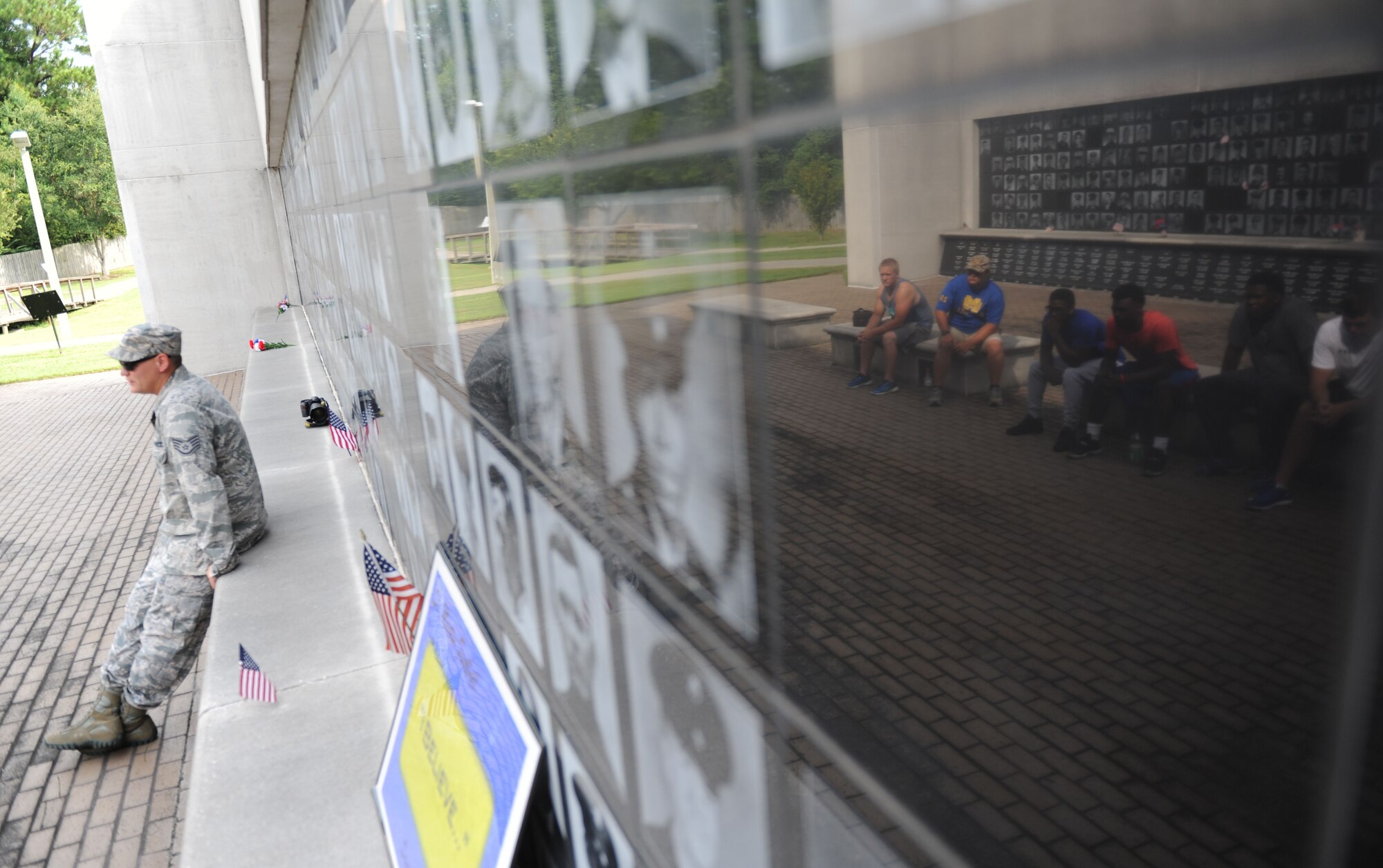 Staff Sgt. Johnathan Land, 338th Training Squadron instructor, talks to St. Martin High School senior football players about the importance of a positive attitude in all situations during a leadership seminar Aug. 8, 2015, at the Mississippi Vietnam Veterans Memorial in Ocean Springs, Miss. The seminar was a collaboration of the St. Martin Gridiron Club and Keesler personnel, who also briefed the students on good attitudes, values, beliefs and teamwork. (U.S. Air Force photo by Kemberly Groue)