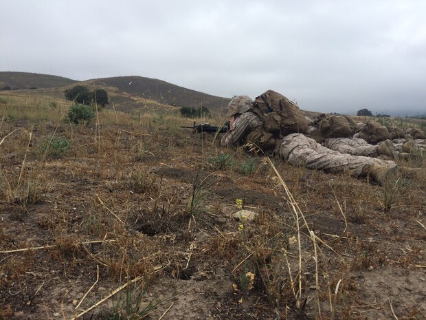 Marines set a 360 degree security at the stop in preparation to assault their last objective point.