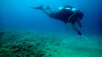 150727-N-ZZ999-001 (July 27, 2015) NAVAL BASE GUAM - A diver conducts underwater post-blast investigation training at Naval Base Guam.