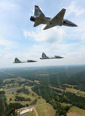 Four T-38 Talons prepare to begin the missing man formation in tribute to Capt. Fredrick Partridge Aug 10, 2015, at the end of his memorial service at Mississippi Veterans Memorial Cemetery. The T-38s from Columbus Air Force Base, Mississippi, performed the aerial salute to Partridge exactly 63 years after his disappearance during the Korean War. (U.S. Air Force photo by Airman 1st Class Daniel Lile)