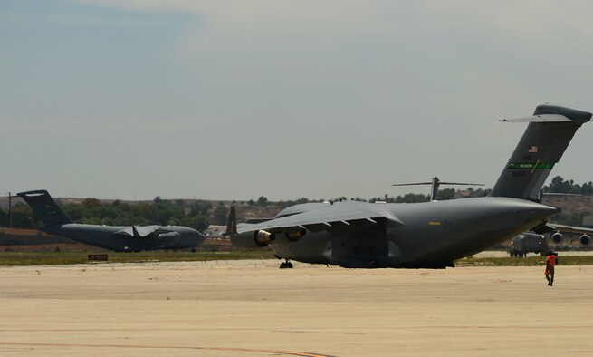 C-17 Globemaster III’s from the 62nd Airlift Wing from Joint Base Lewis McChord, Wash., arrive at March Air Reserve Base, Calif., Aug. 1, 2015, for a Joint Operation Access Exercise.  The C-17s would conduct air drop, air land and personal drop missions during the two day exercise. (U.S. Air Force photo\ Staff Sgt. Tim Chacon)